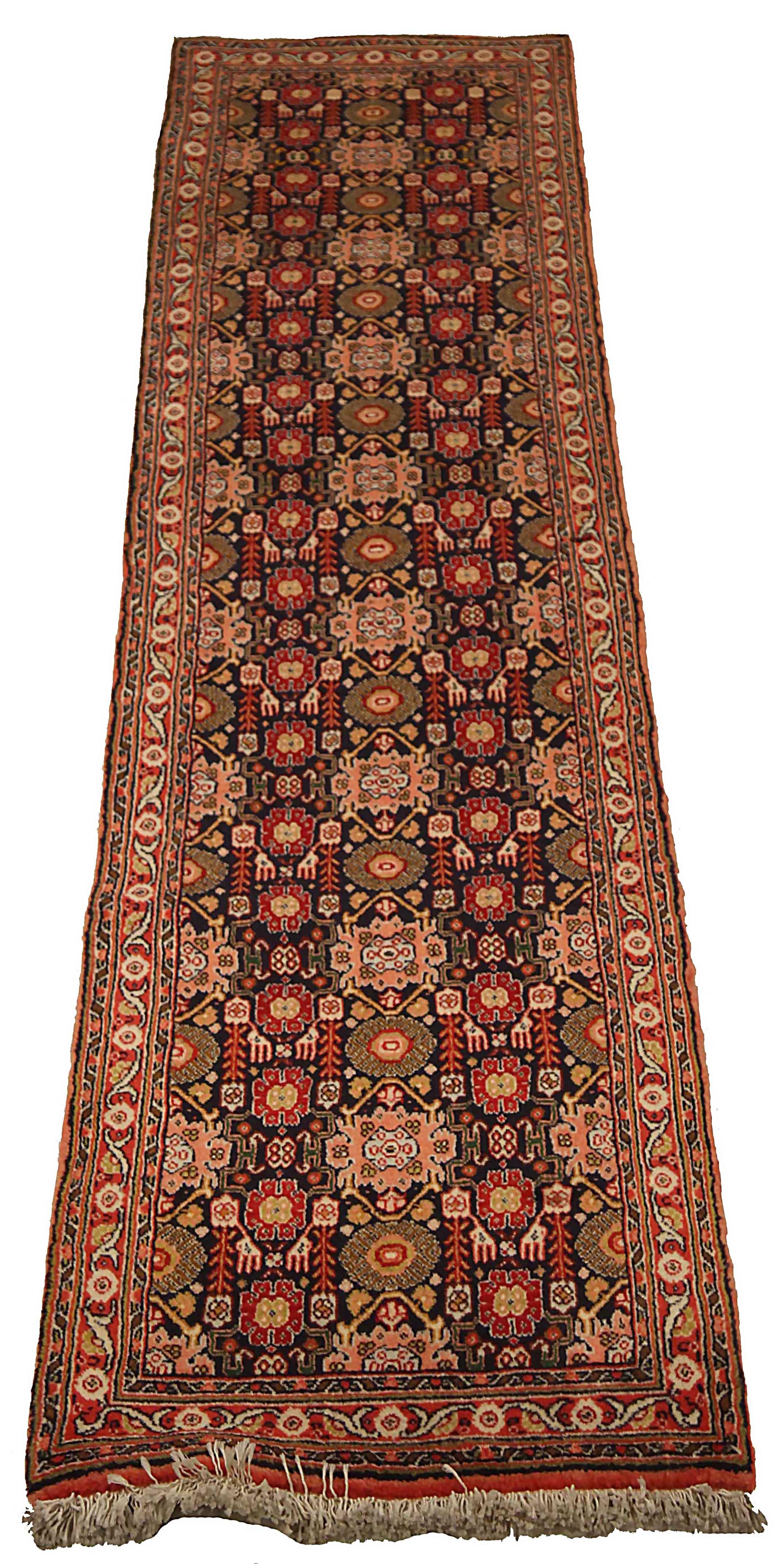 Antique Persian runner rug handwoven from the finest sheep’s wool. It’s colored with all-natural vegetable dyes that are safe for humans and pets. It’s a traditional Kurdish design handwoven by expert artisans. It’s a lovely runner rug that can be