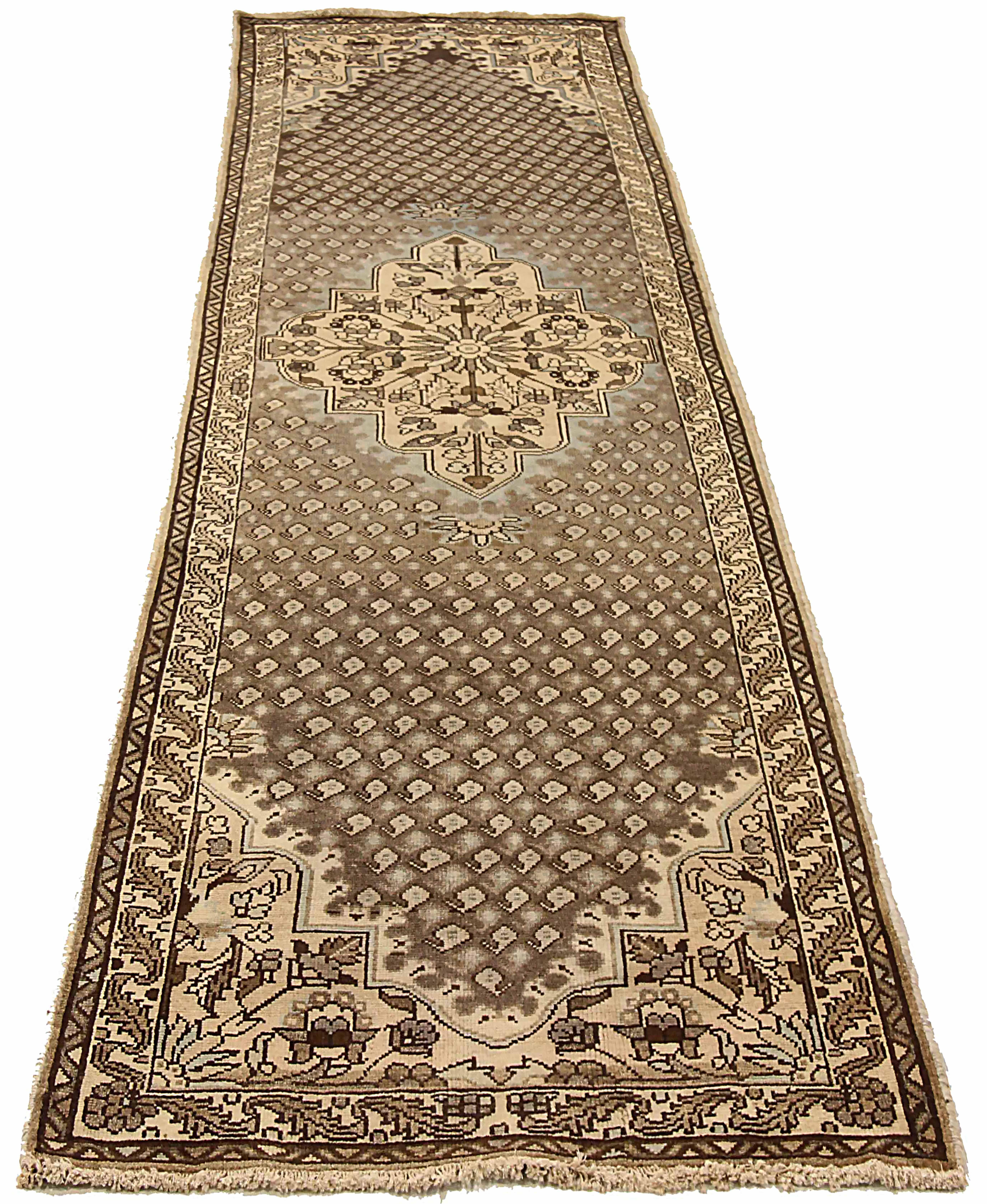 Antique Persian area rug handwoven from the finest sheep’s wool. It’s colored with all-natural vegetable dyes that are safe for humans and pets. It’s a traditional Malayer design handwoven by expert artisans. It’s a lovely runner rug that can be