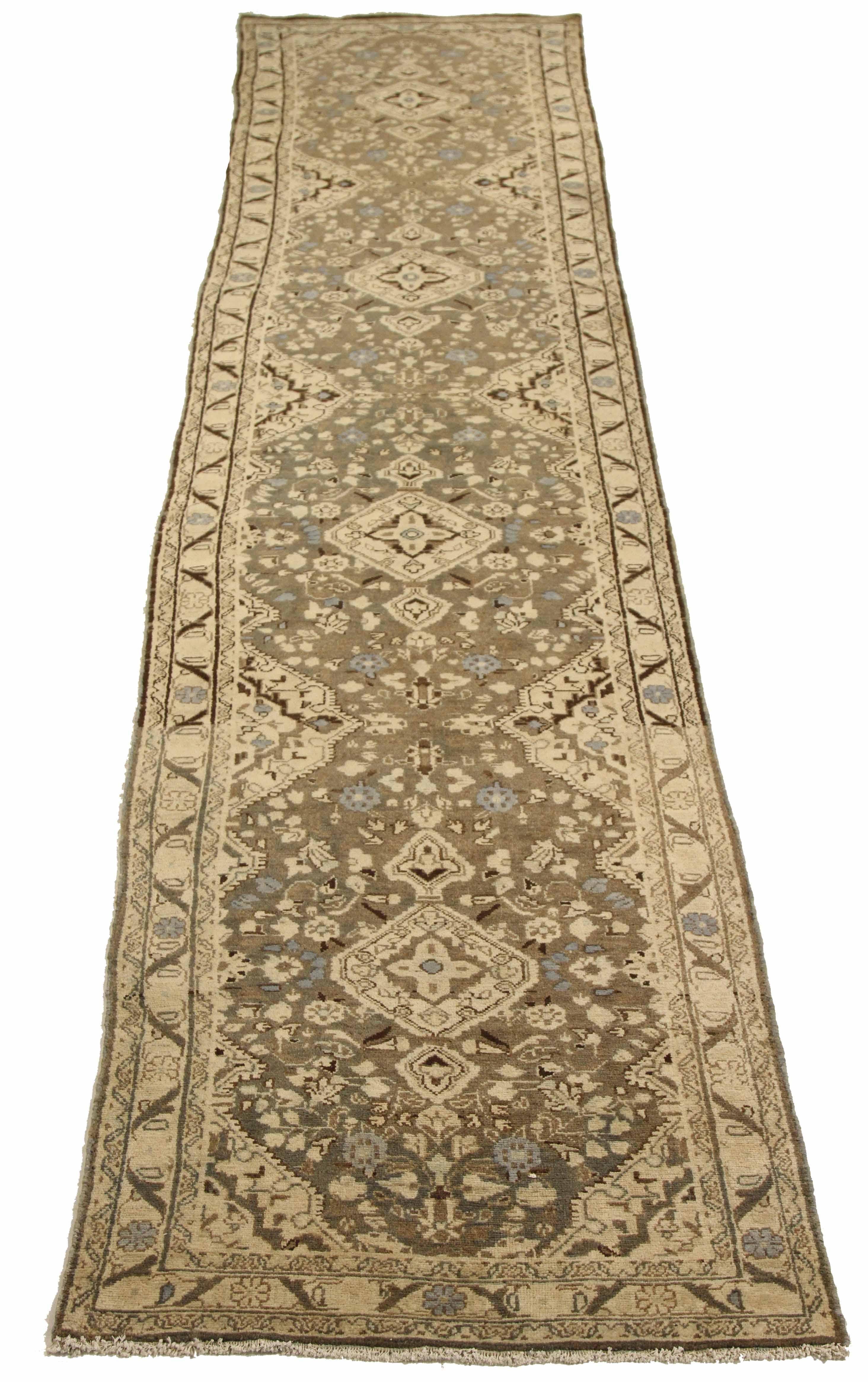 Antique Persian runner rug handwoven from the finest sheep’s wool. It’s colored with all-natural vegetable dyes that are safe for humans and pets. It’s a traditional Malayer design handwoven by expert artisans. It’s a lovely runner rug that can be