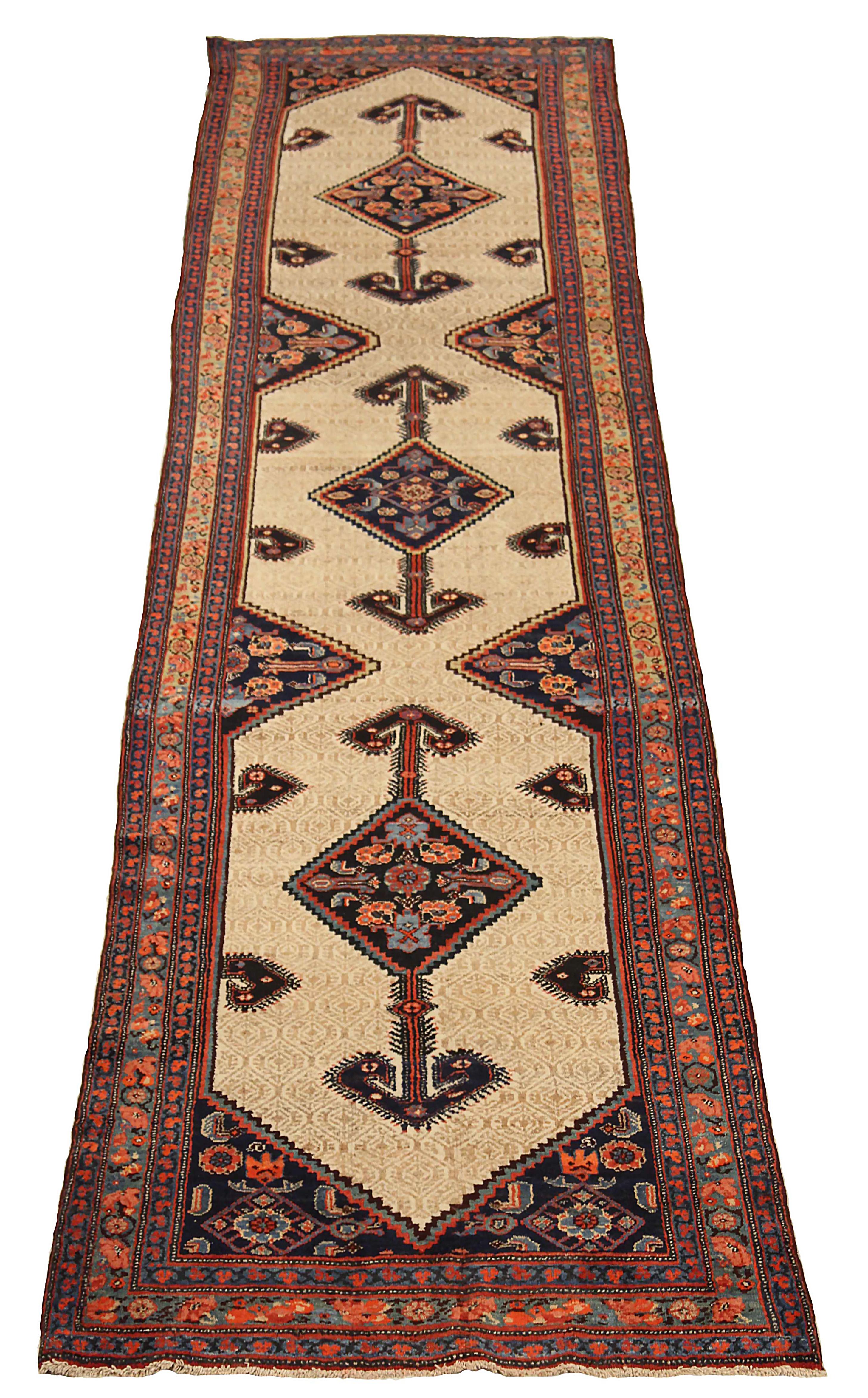 Antique Persian runner rug handwoven from the finest sheep’s wool. It’s colored with all-natural vegetable dyes that are safe for humans and pets. It’s a traditional Malayer design handwoven by expert artisans. It’s a lovely runner rug that can be