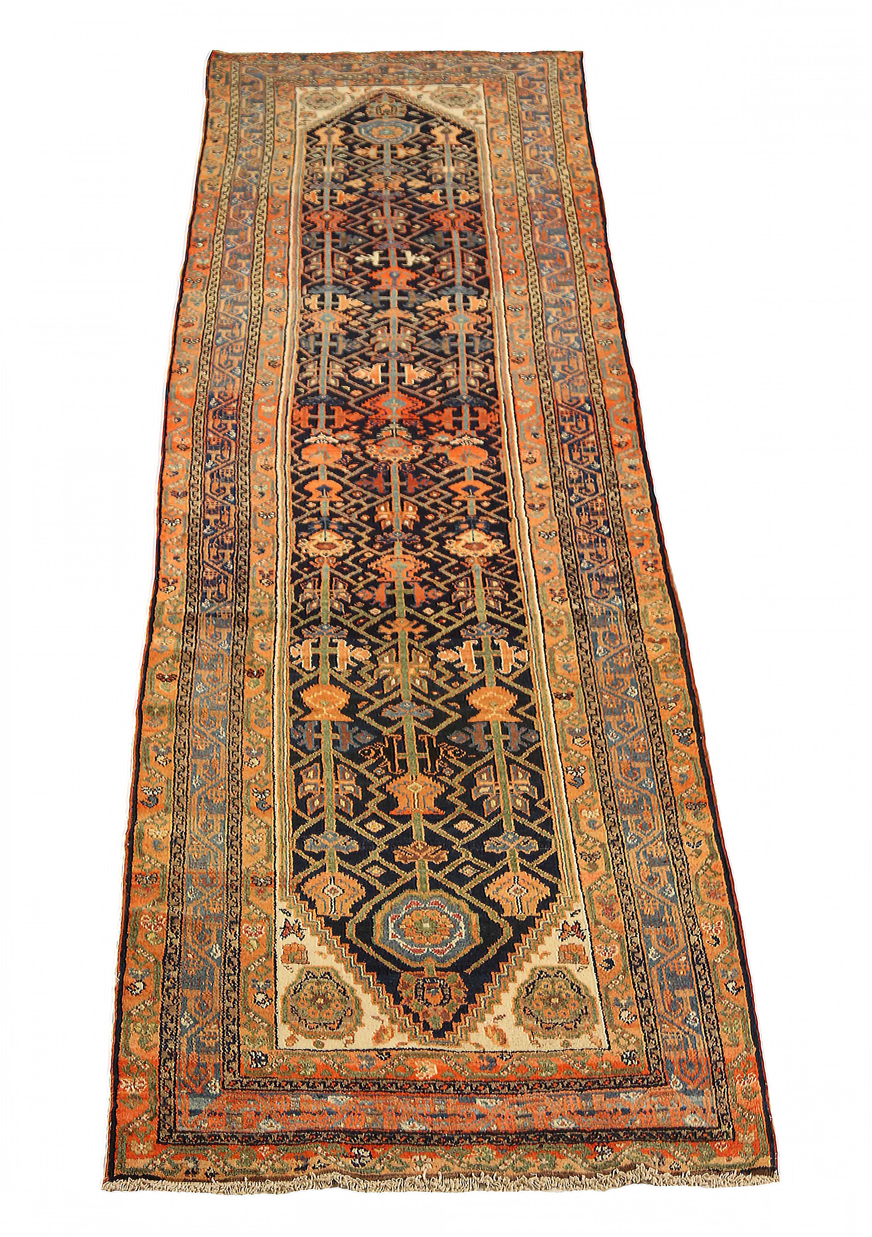 Antique Persian runner rug handwoven from the finest sheep’s wool. It’s colored with all-natural vegetable dyes that are safe for humans and pets. It’s a traditional Malayer design handwoven by expert artisans. It’s a lovely runner rug that can be