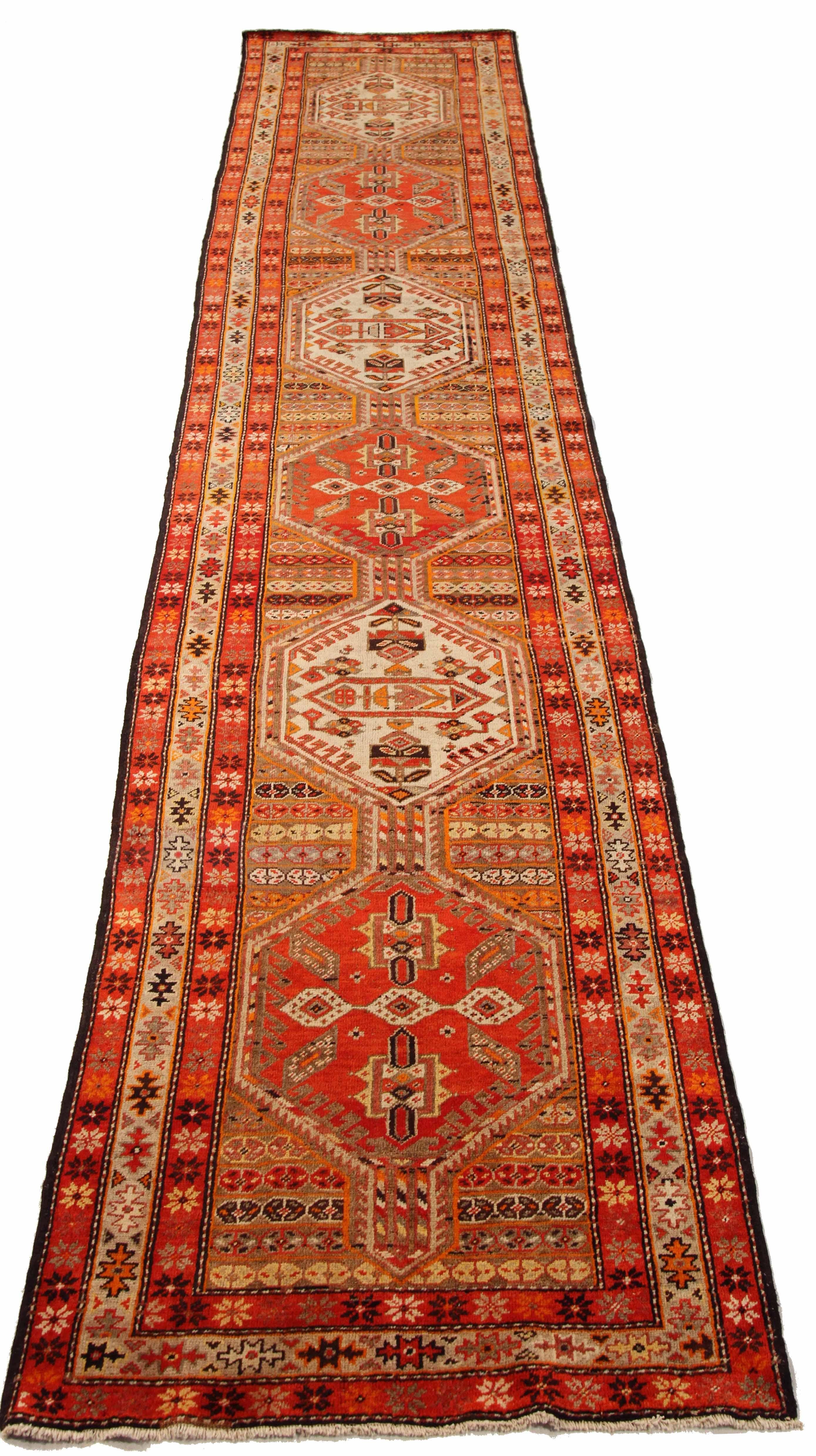 Antique Persian runner rug handwoven from the finest sheep’s wool. It’s colored with all-natural vegetable dyes that are safe for humans and pets. It’s a traditional Malayer design handwoven by expert artisans. It’s a lovely runner rug that can be