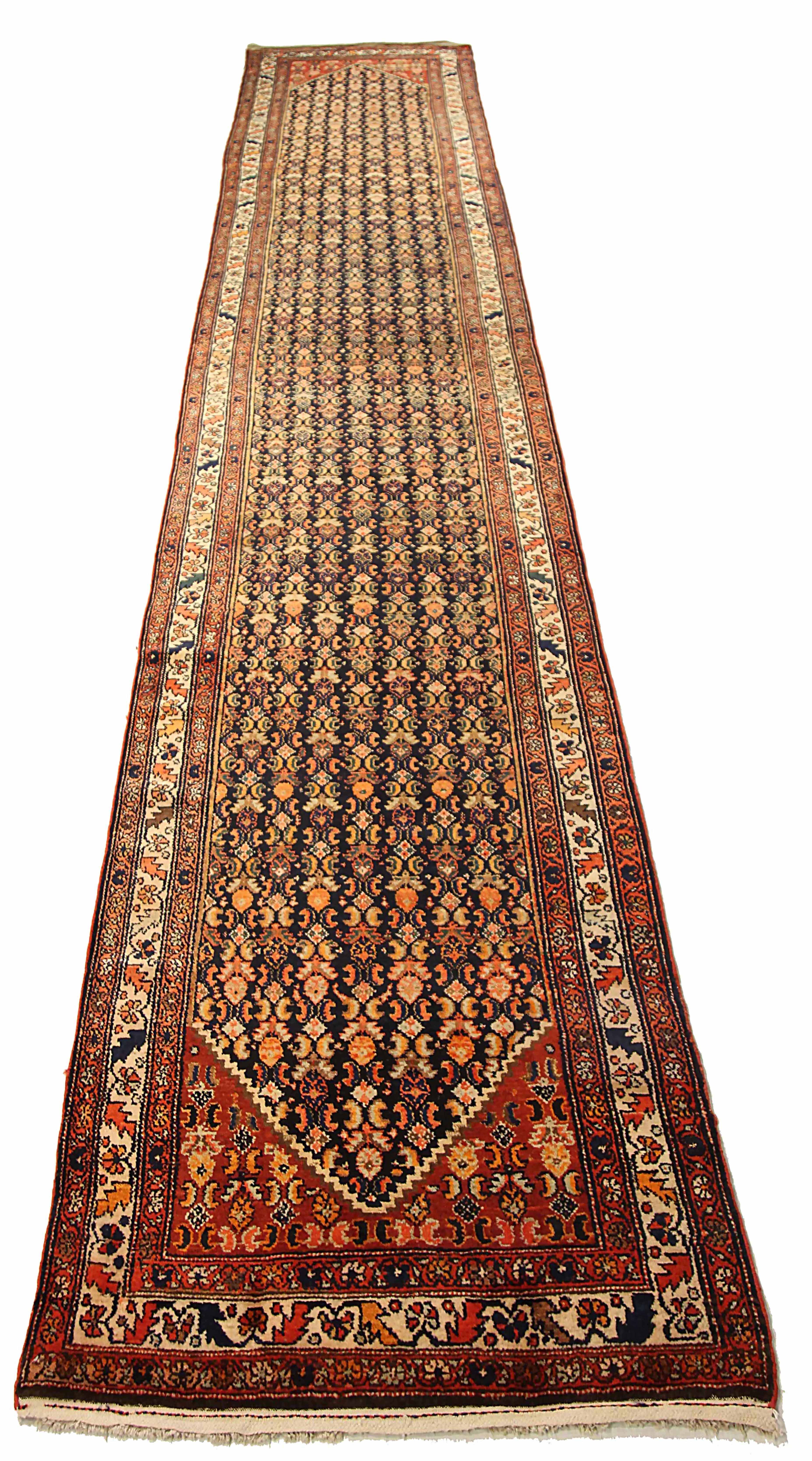 Antique Persian runner rug handwoven from the finest sheep’s wool. It’s colored with all-natural vegetable dyes that are safe for humans and pets. It’s a traditional Malayer design handwoven by expert artisans. It’s a lovely runner rug that can be