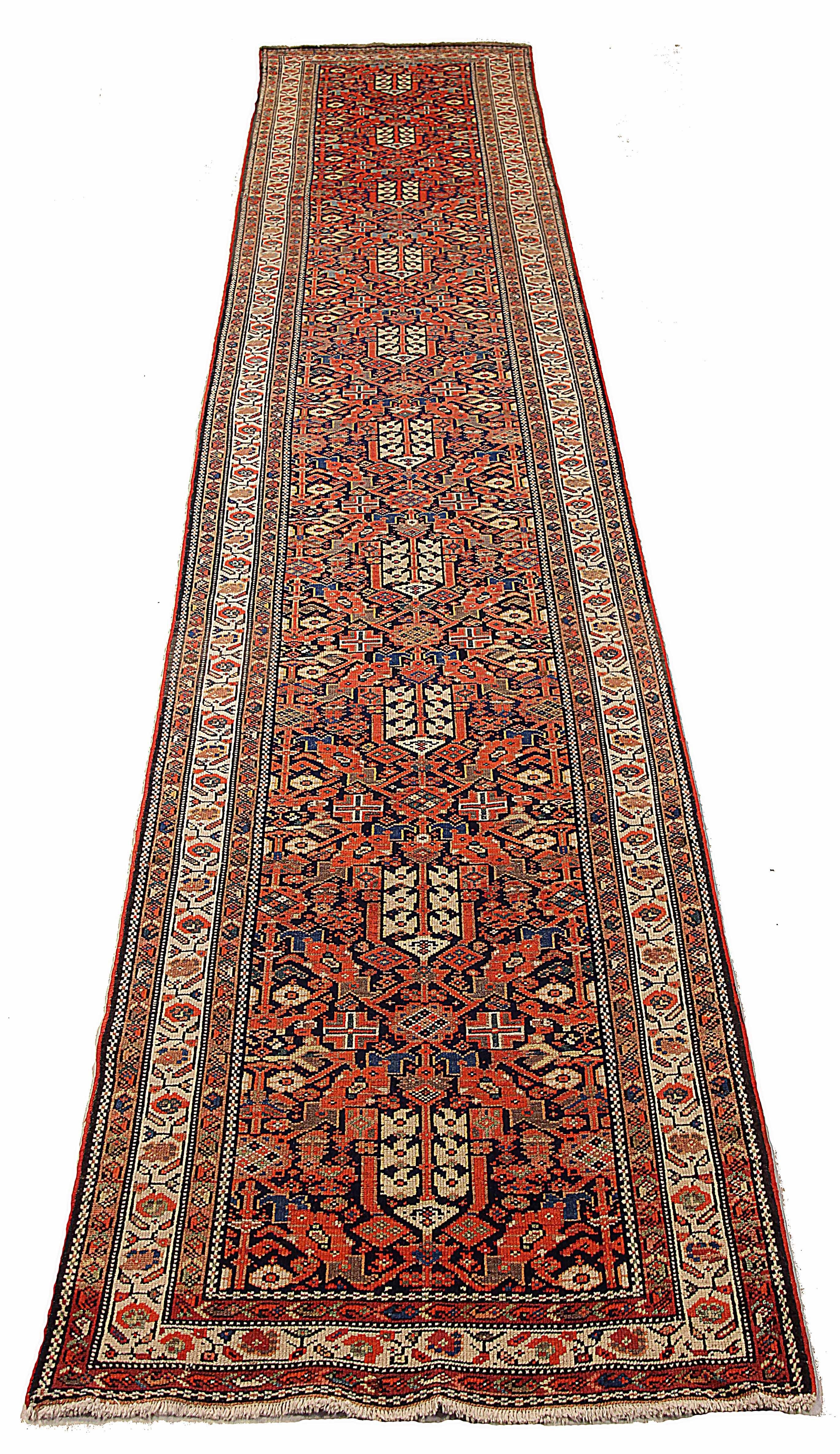 Antique Persian runner rug handwoven from the finest sheep’s wool. It’s colored with all-natural vegetable dyes that are safe for humans and pets. It’s a traditional Malayer design handwoven by expert artisans. It’s a lovely runner rug that can be