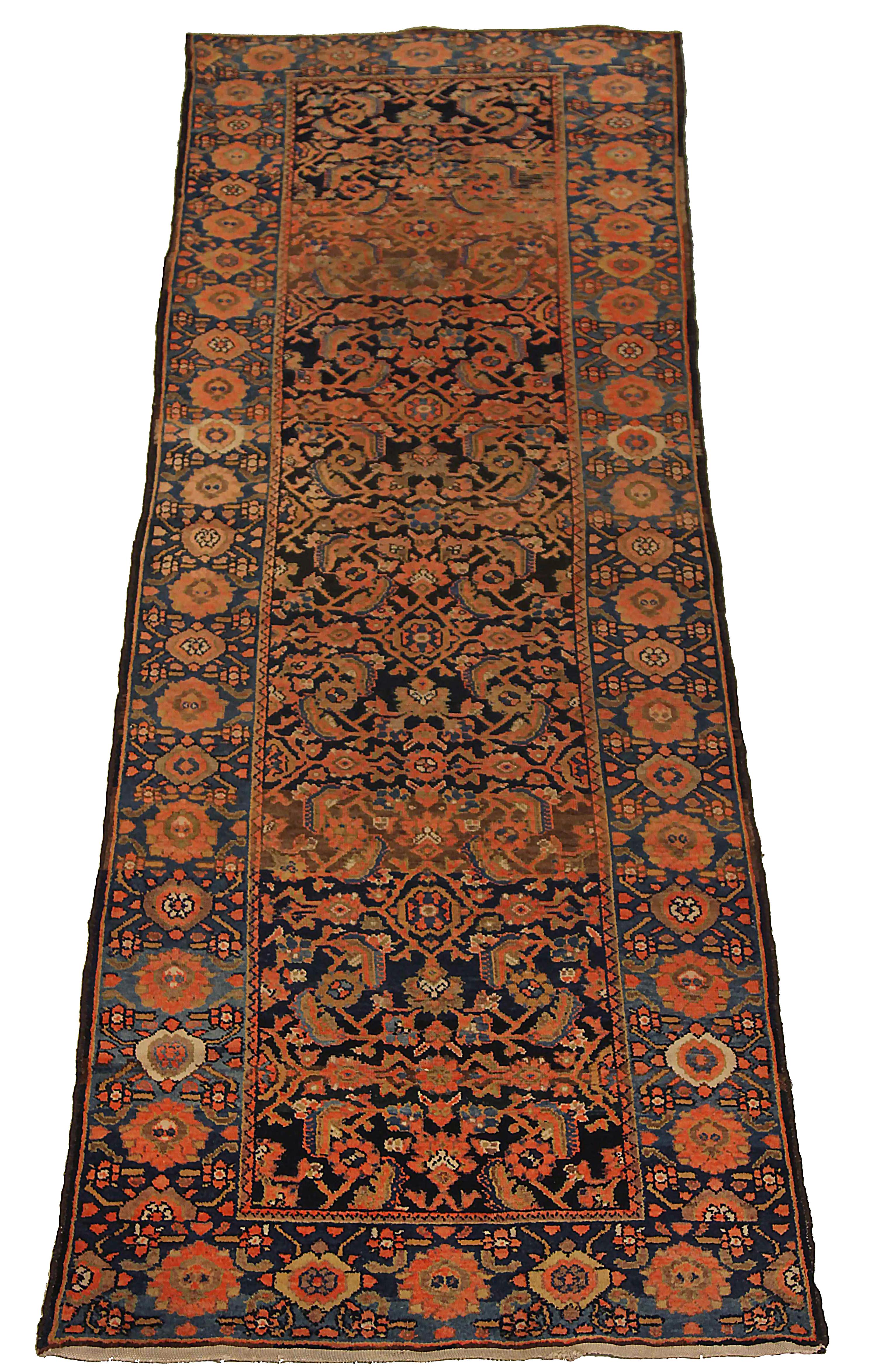 Antique Persian runner rug handwoven from the finest sheep’s wool. It’s colored with all-natural vegetable dyes that are safe for humans and pets. It’s a traditional Malayer design handwoven by expert artisans. It’s a lovely runner rug that can be