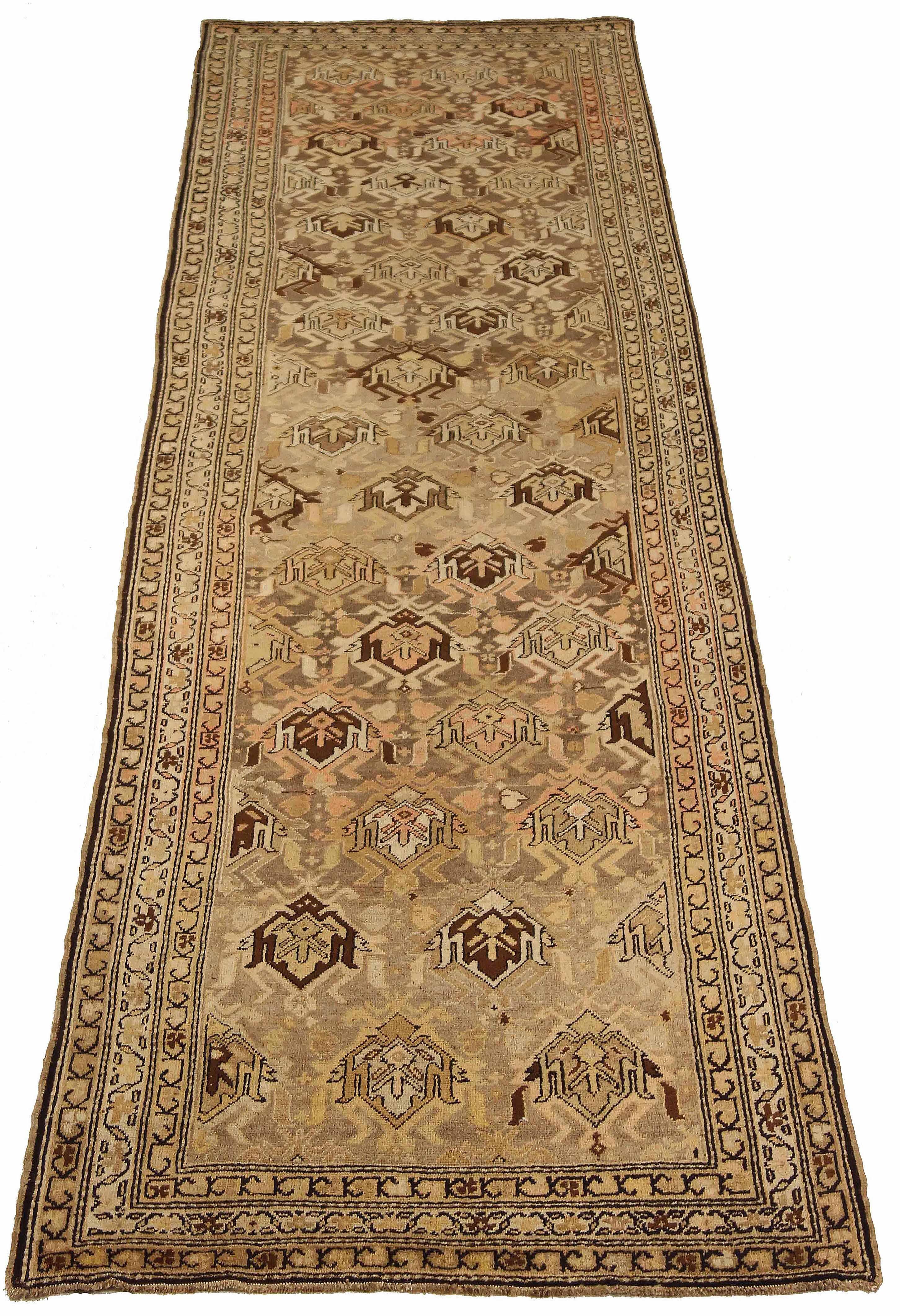 Antique Persian runner rug handwoven from the finest sheep’s wool. It’s colored with all-natural vegetable dyes that are safe for humans and pets. It’s a traditional Meshkin design handwoven by expert artisans. It’s a lovely runner rug that can be