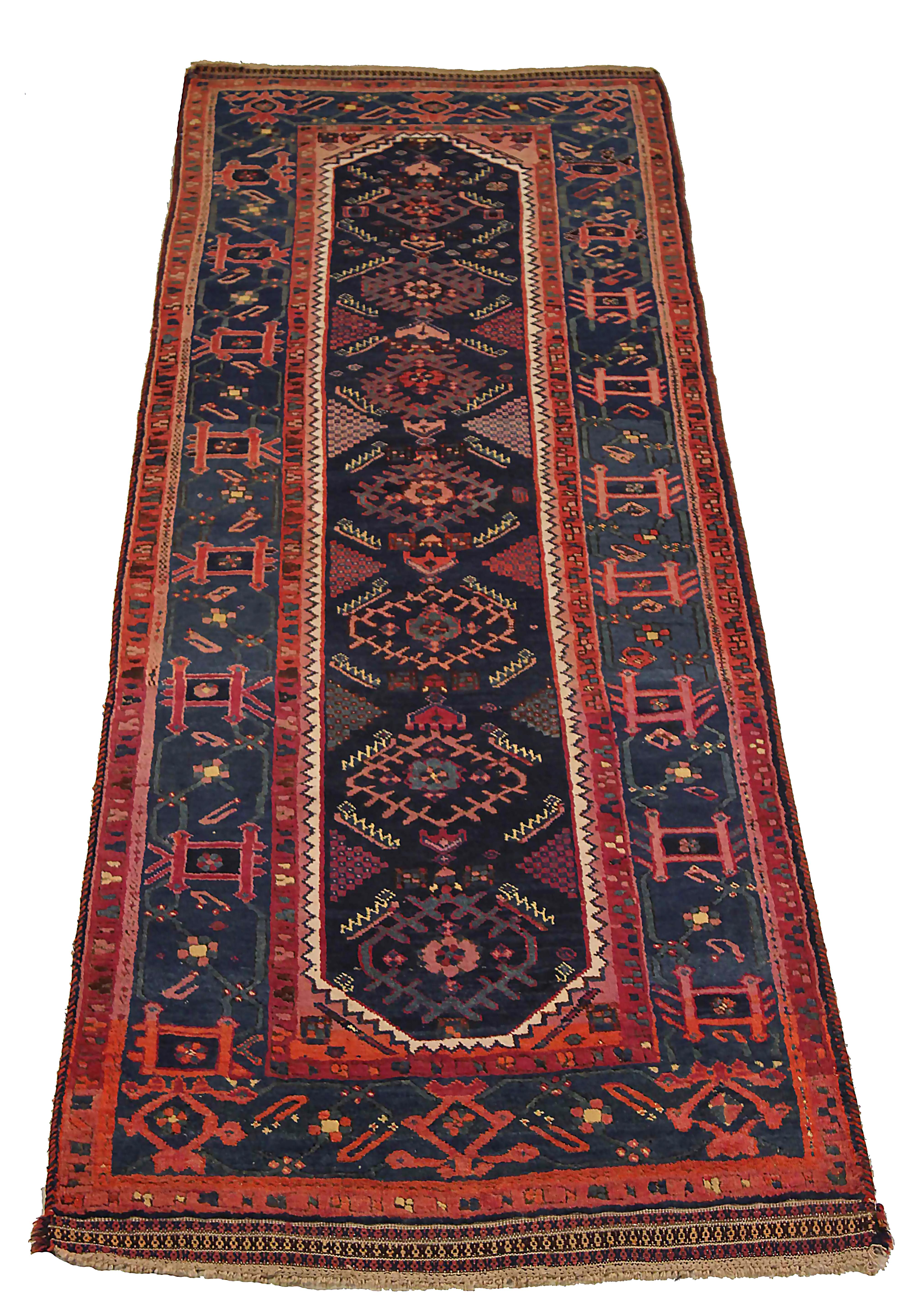 Antique Persian runner rug handwoven from the finest sheep’s wool. It’s colored with all-natural vegetable dyes that are safe for humans and pets. It’s a traditional Shiraz design handwoven by expert artisans. It’s a lovely runner rug that can be