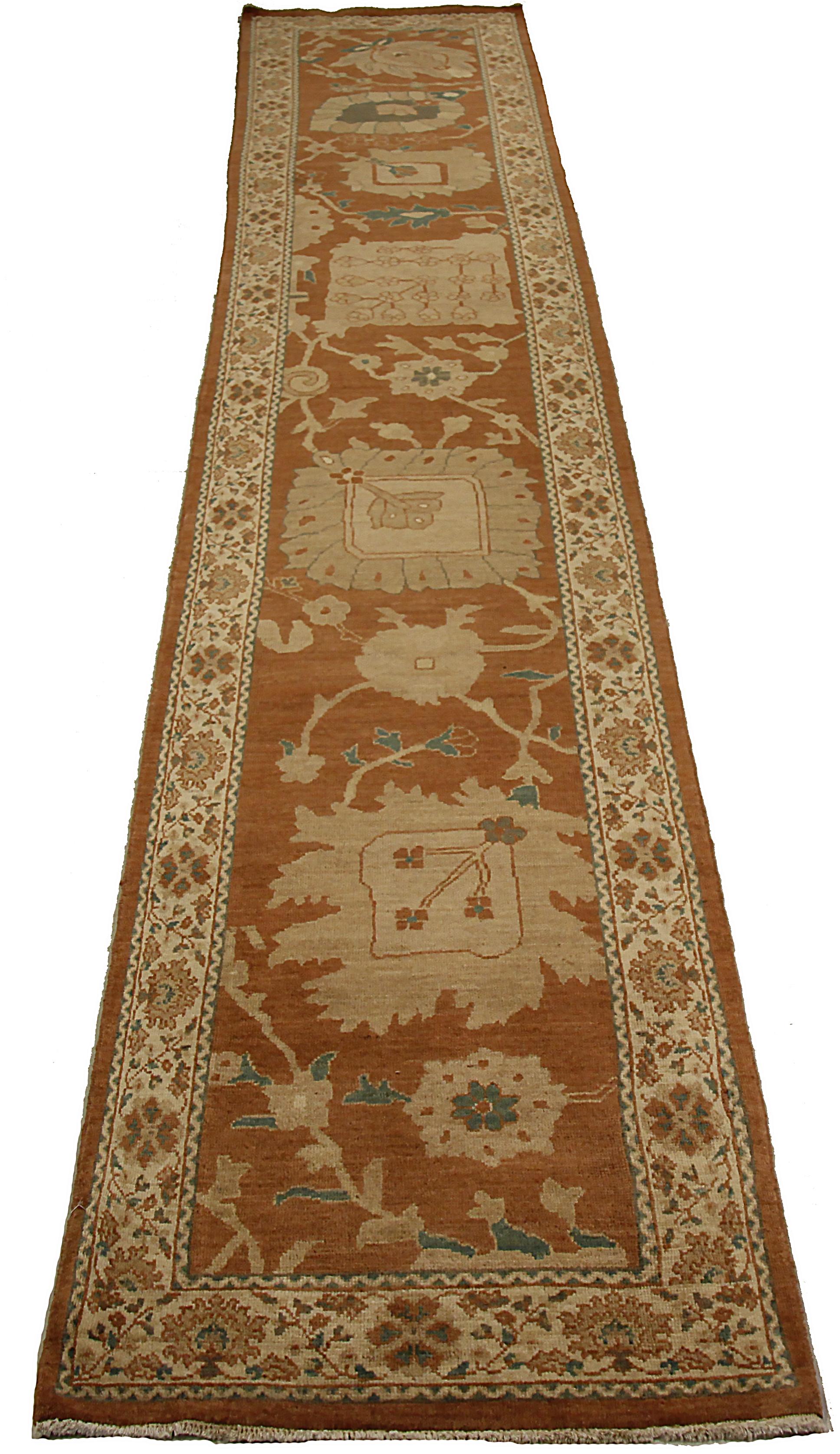 Antique Turkish runner rug from high quality sheep’s wool and colored with eco-friendly vegetable dyes that are proven safe for humans and pets alike. It’s a classic Sultanabad design showcasing a regal brown field with prominent Herati flower heads