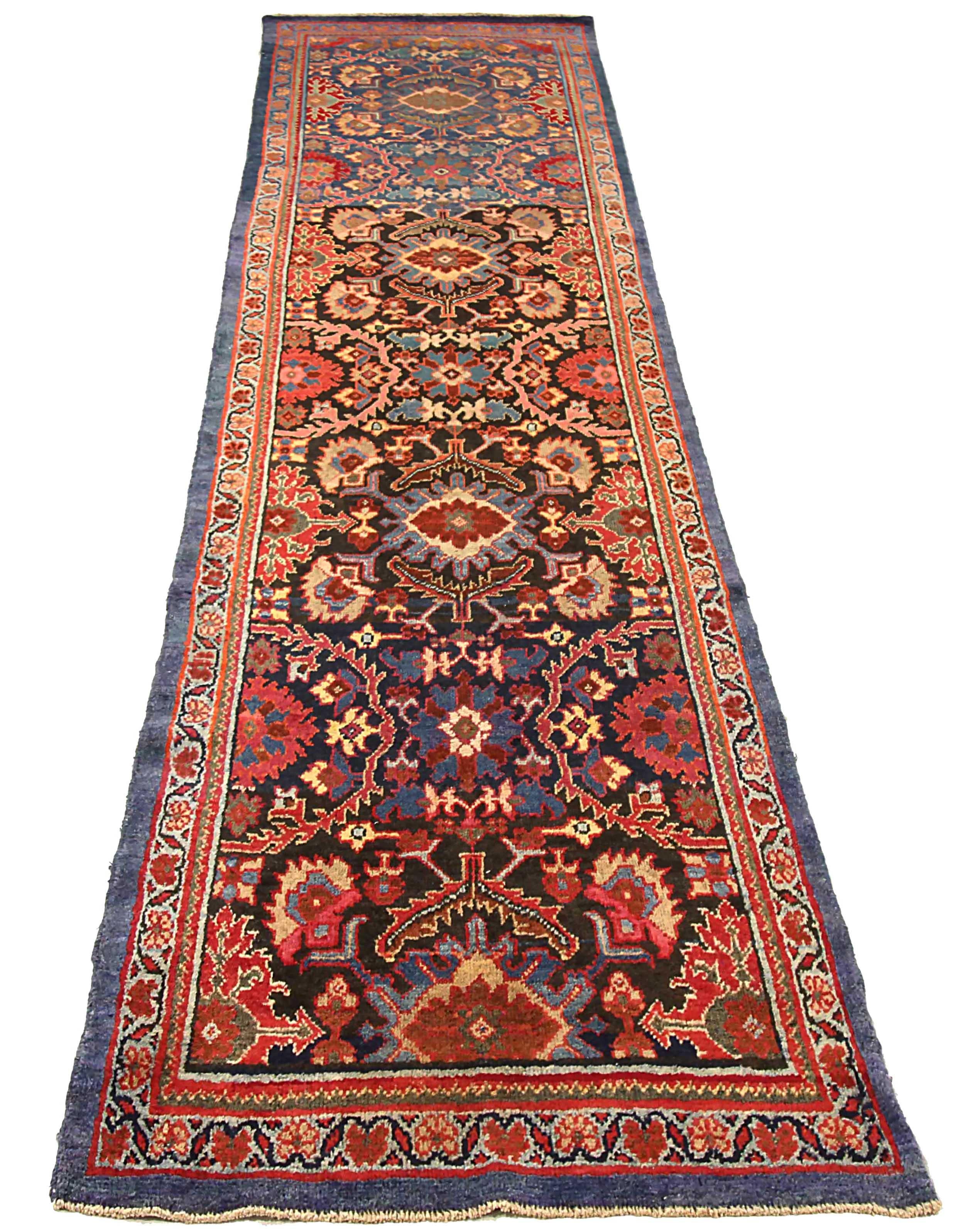 Antique Persian runner rug handwoven from the finest sheep’s wool. It’s colored with all-natural vegetable dyes that are safe for humans and pets. It’s a traditional Sultanabad design handwoven by expert artisans. It’s a lovely runner rug that can