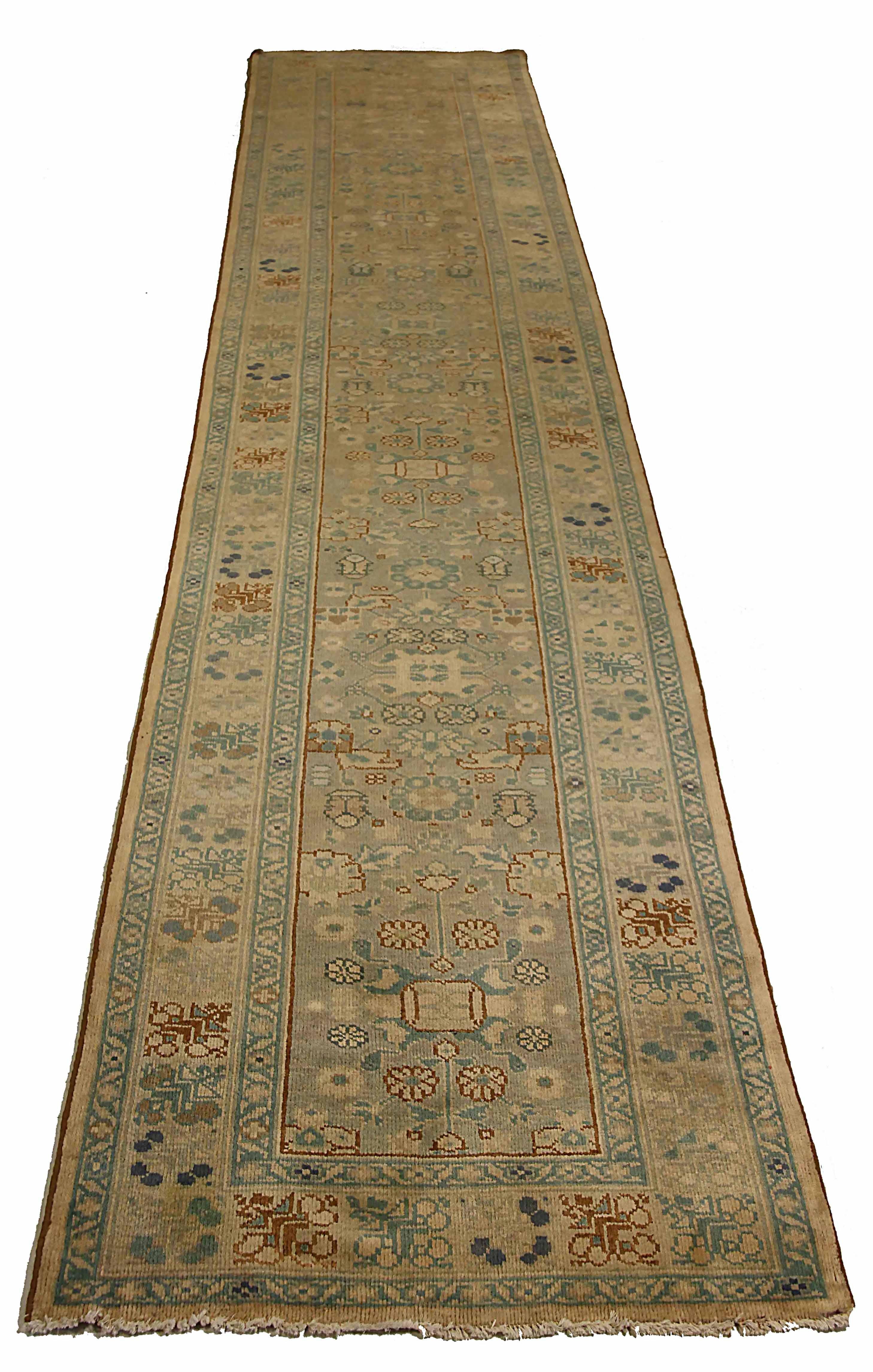 Antique Persian runner rug handwoven from the finest sheep’s wool. It’s colored with all-natural vegetable dyes that are safe for humans and pets. It’s a traditional Sultanabad design handwoven by expert artisans. It’s a lovely runner rug that can