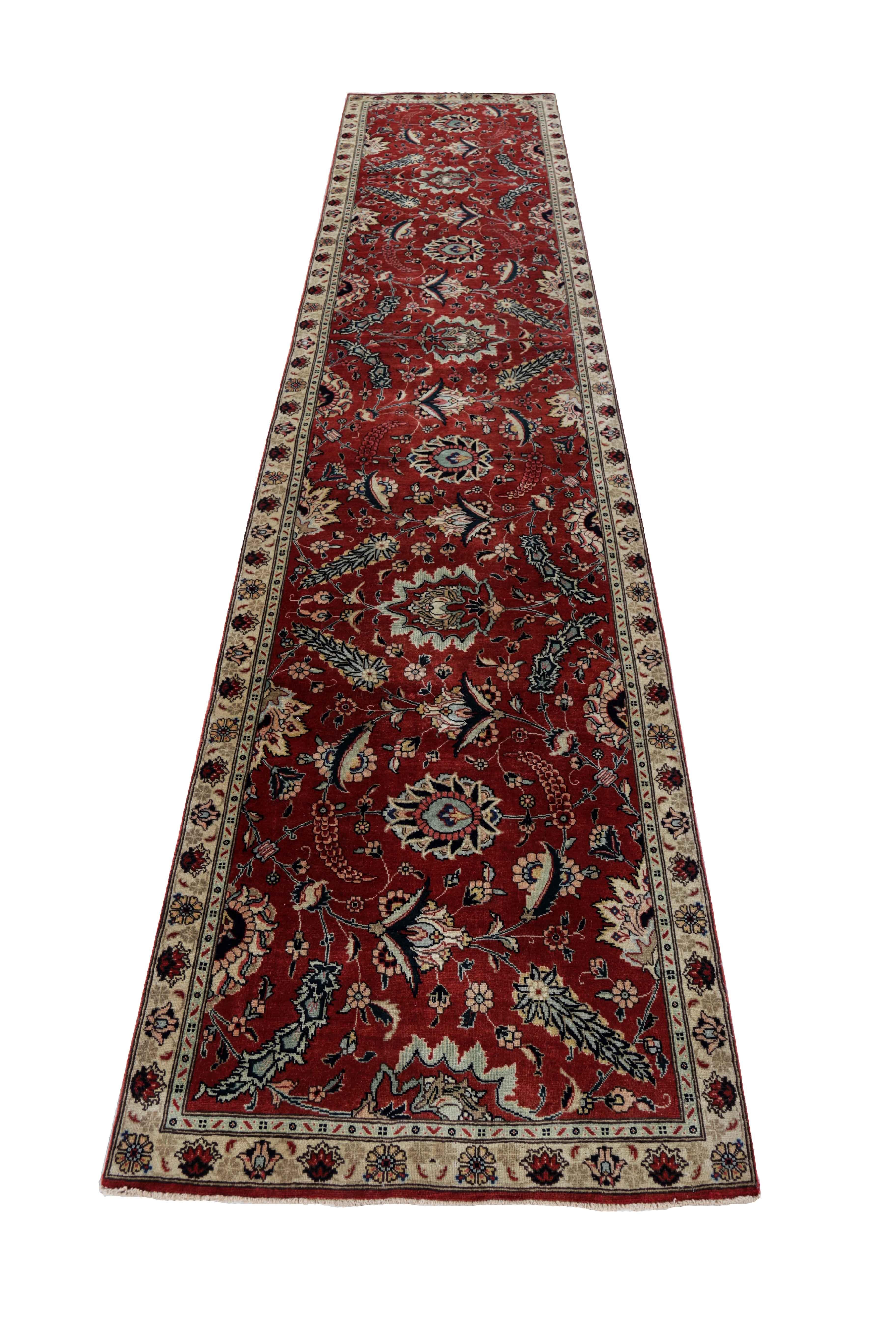 Antique Persian runner rug handwoven from the finest sheep’s wool. It’s colored with all-natural vegetable dyes that are safe for humans and pets. It’s a traditional Tabriz design handwoven by expert artisans. It’s a lovely runner rug that can be