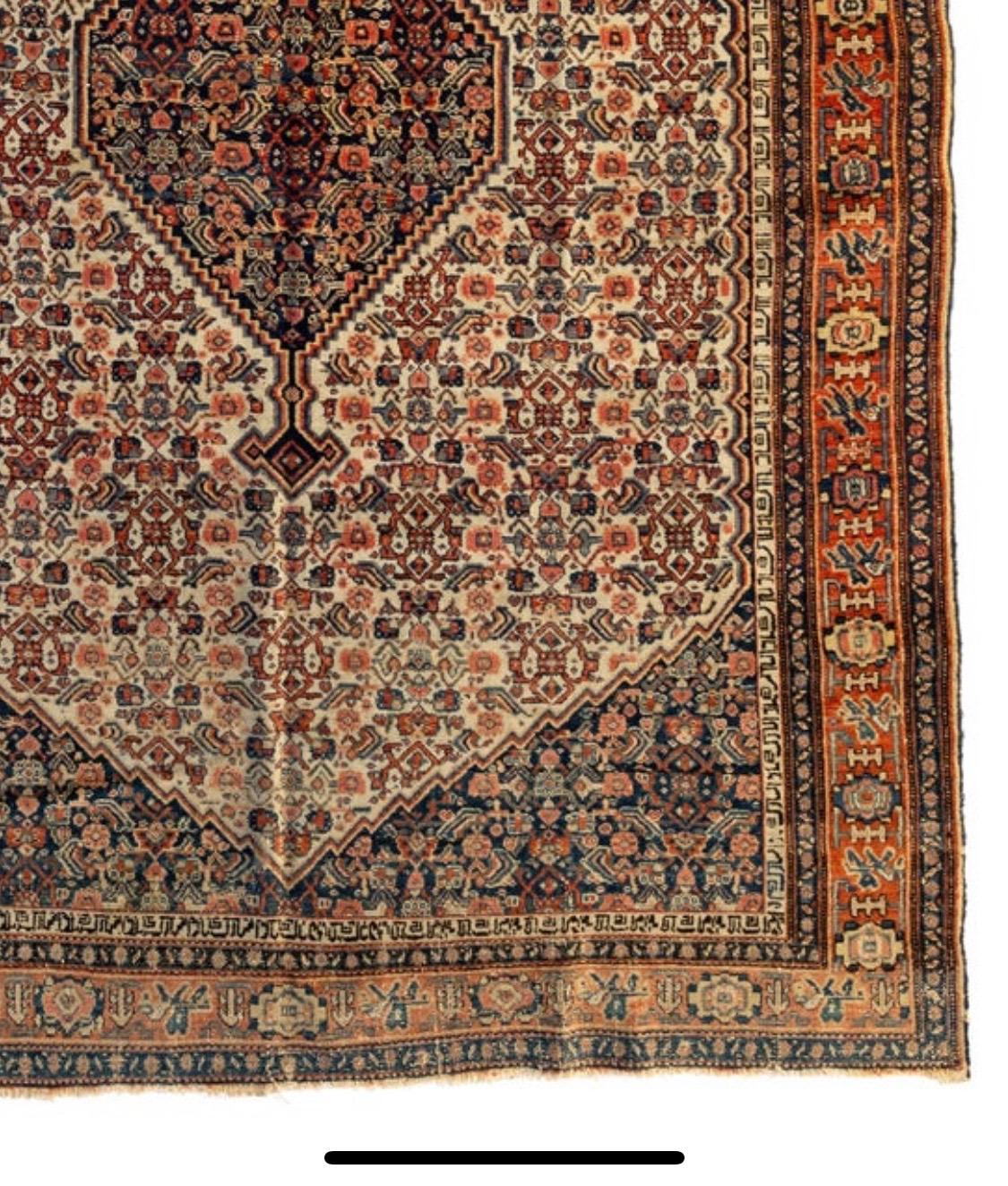 Antique Senneh rugs come from the Northwest region of Iran and the construction provides insight into the elegance of French tapestries. These rugs are the thinnest of Persian rugs, often with a single layer. They range in color from brilliant to