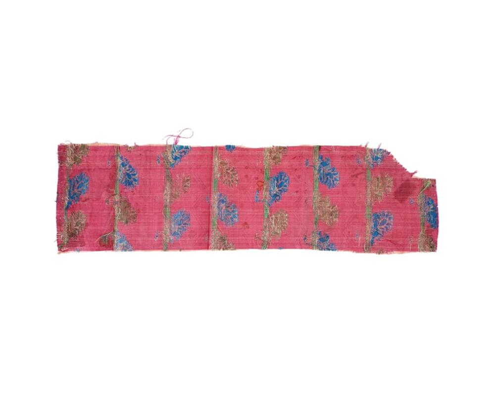An antique Persian Iranian Safavid dynasty hand woven textile wall hanging. The textile is adorned with a traditional foliage ornament. Circa: 18th century. Safavid Iran or Safavid Persia, also referred to as the Safavid Empire, was one of the