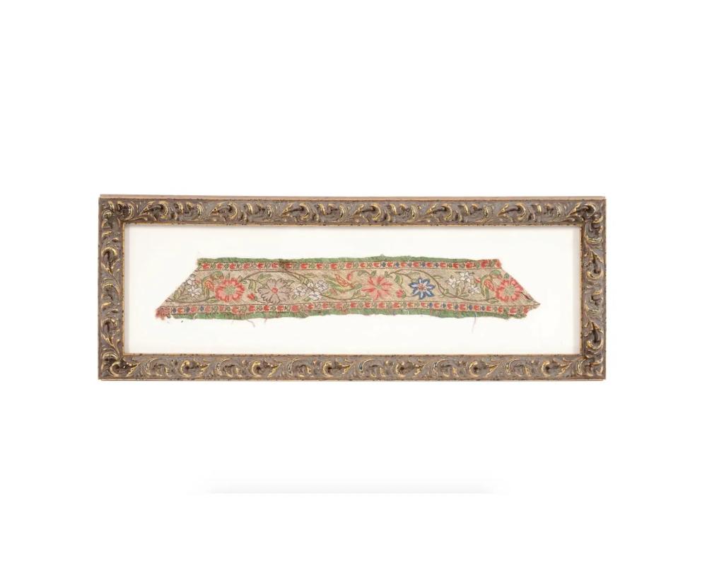 An antique Persian fragment of textile tapestry. Late Safavid dynasty, 18th century. Floral pattern in red and green. Canvas mat, golden frame. Collectible Furnishing And Textiles, Oriental Islamic Folk Arts And Applied Arts,