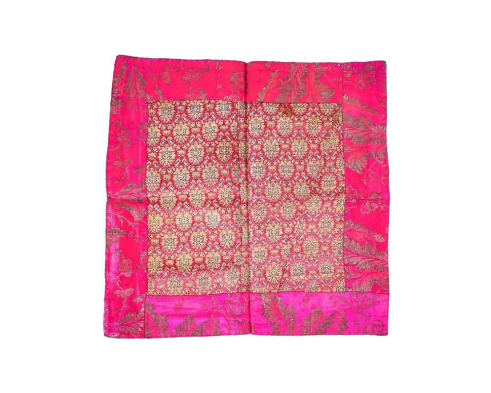 An antique Persian Iranian Safavid dynasty hand woven embroidered red textile tapestry. The textile is adorned with hand woven raised floral and foliage motifs. Safavid Iran or Safavid Persia, also referred to as the Safavid Empire, was one of the