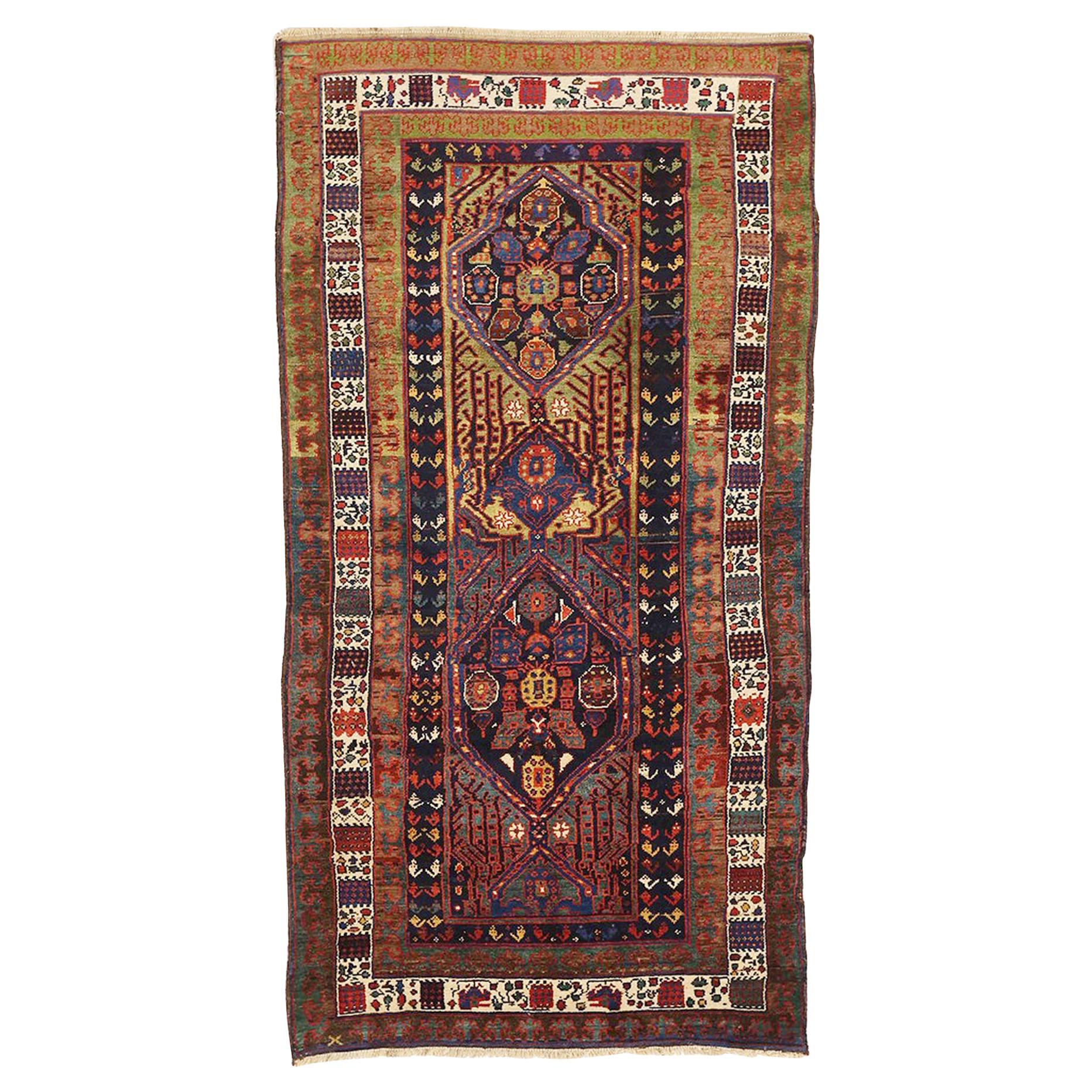 Antique Persian Sarab Runner Rug with Red and Blue Floral Medallions For Sale