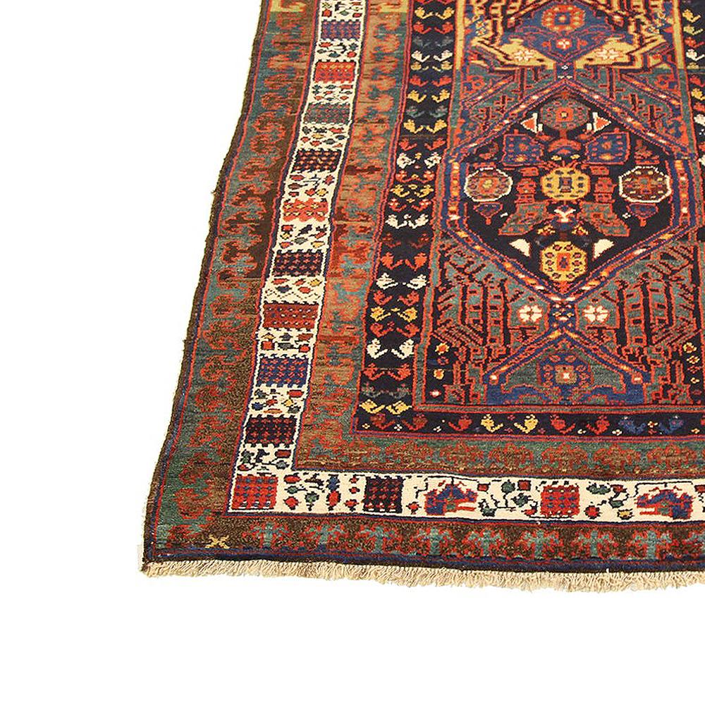 Hand-Woven Antique Persian Sarab Runner Rug with Red and Blue Floral Medallions For Sale