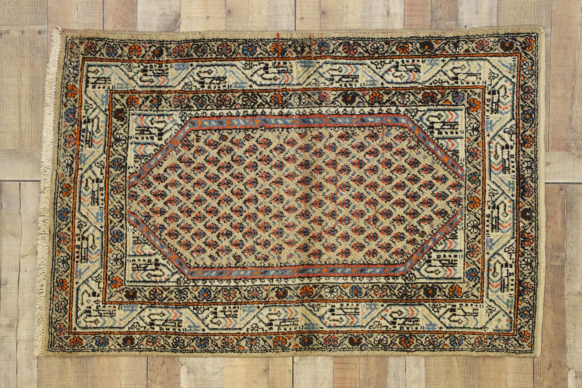 72632, antique Persian Saraband rug with Mir Boteh design. The antique Persian Saraband rug features a delicate pattern of Mir boteh motifs in diagonal rows in a beige field. The boteh resembles sprouting seed and is known as the 