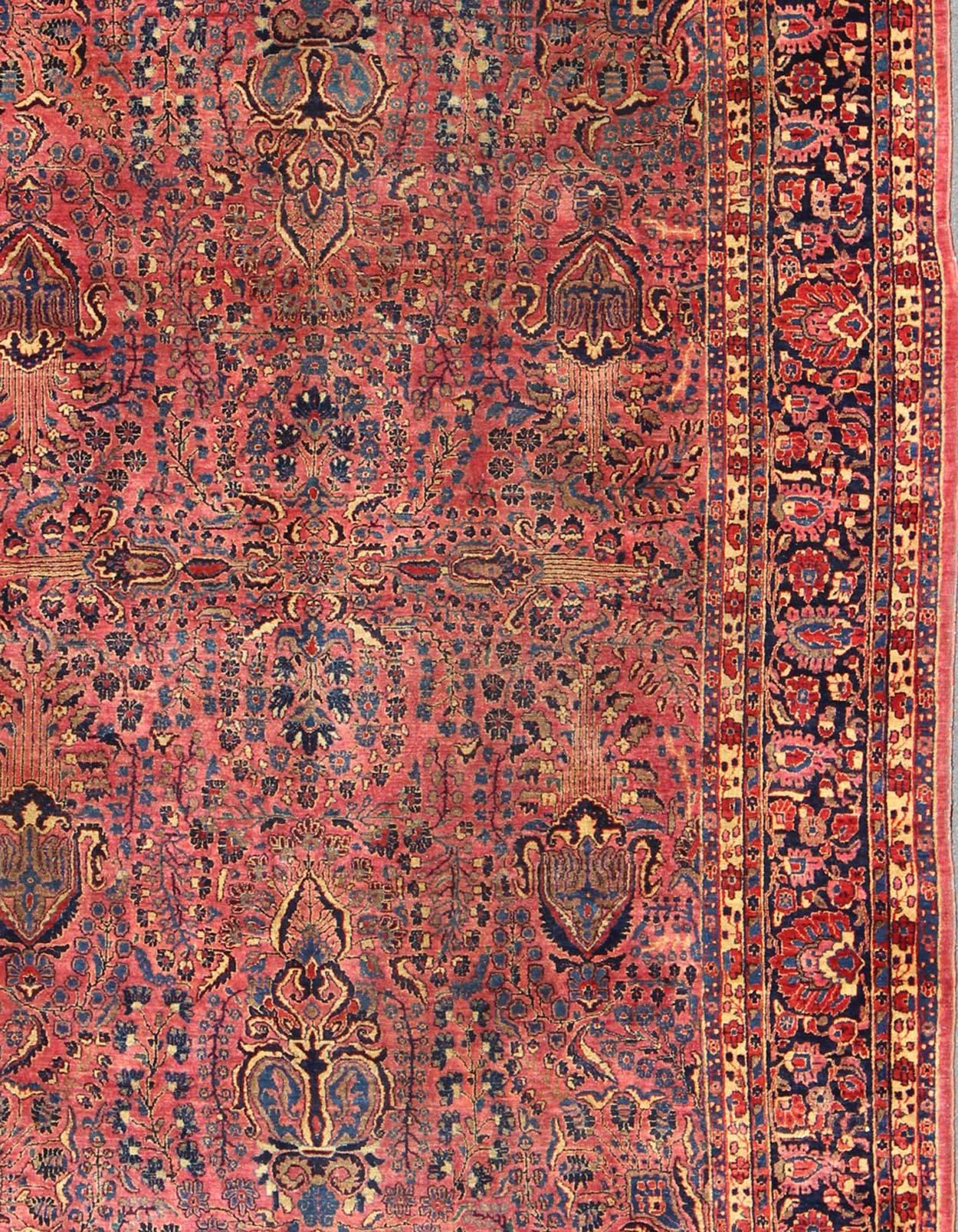 Hand-Knotted Antique Persian Sarouk Carpet with Deep Cranberry Field and Floral Elements