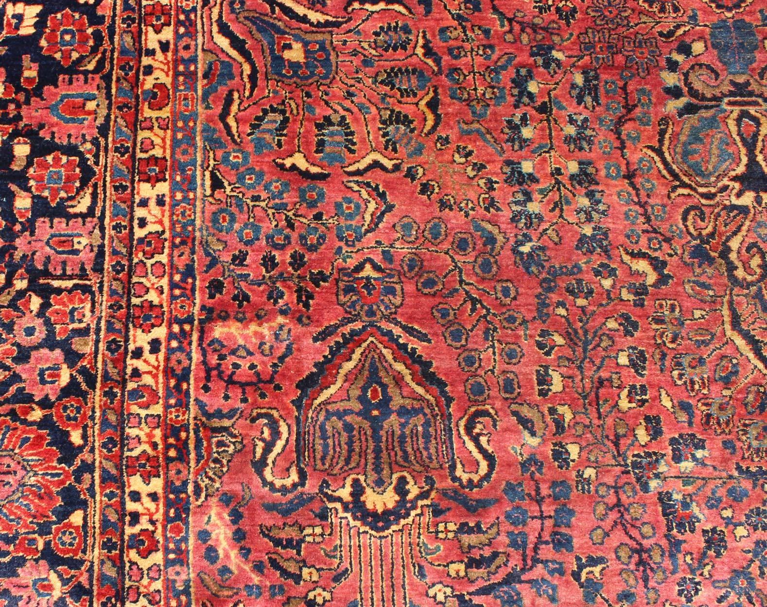 Wool Antique Persian Sarouk Carpet with Deep Cranberry Field and Floral Elements