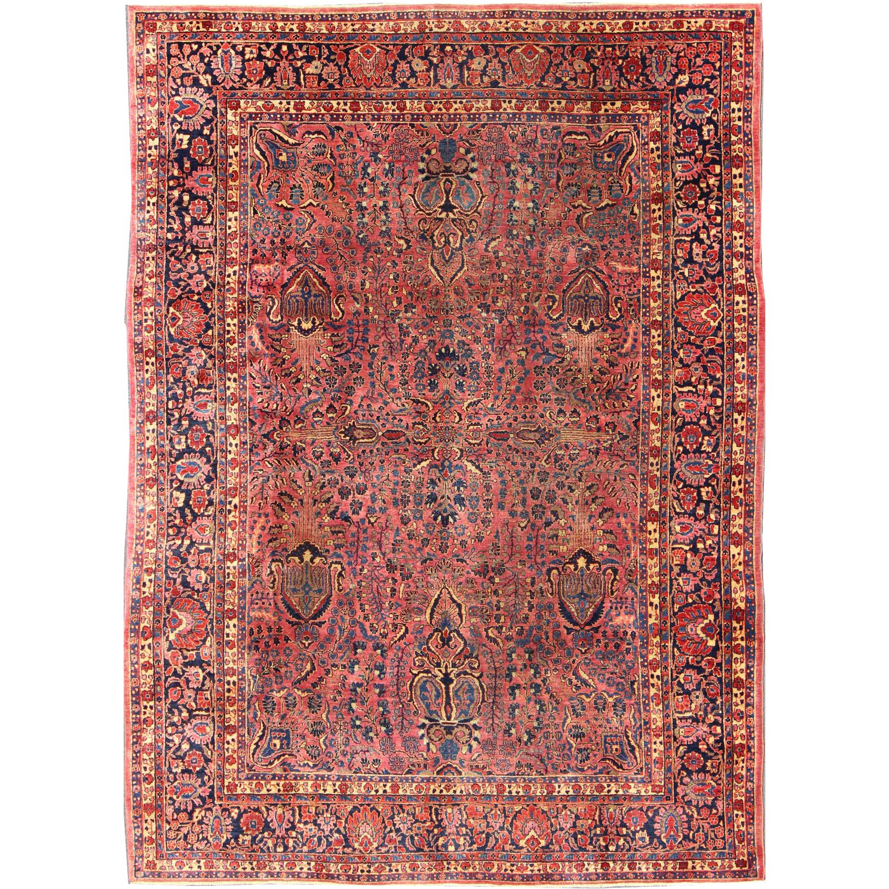 Antique Persian Sarouk Carpet with Deep Cranberry Field and Floral Elements