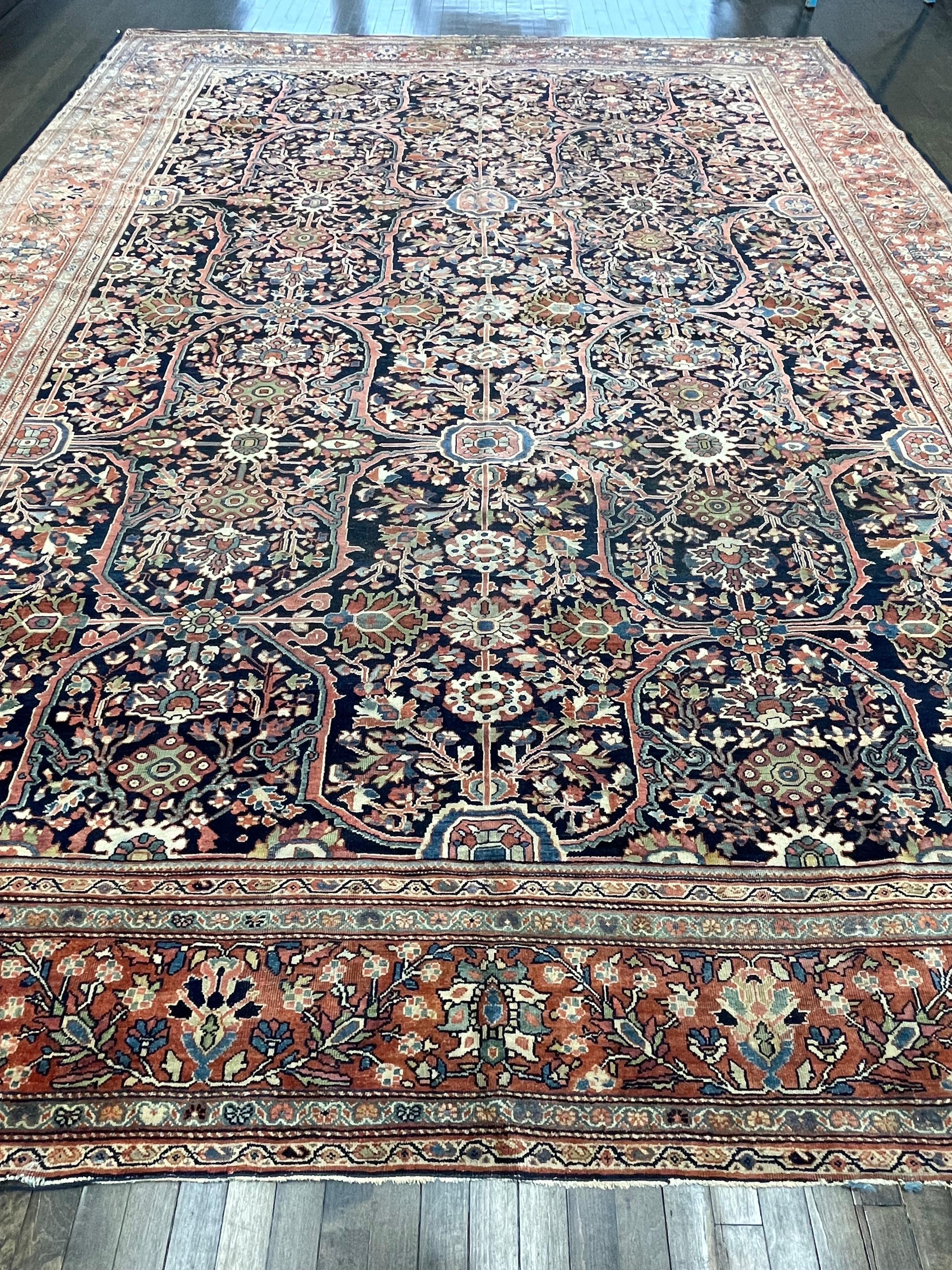 Tightly hand knotted, this carpet is made in the town of Farahan in west Persia. Farahan rugs are made with hard wool and clipped very flat. The restrained style of decoration is almost gothic in character. The foundation is strong, often rather