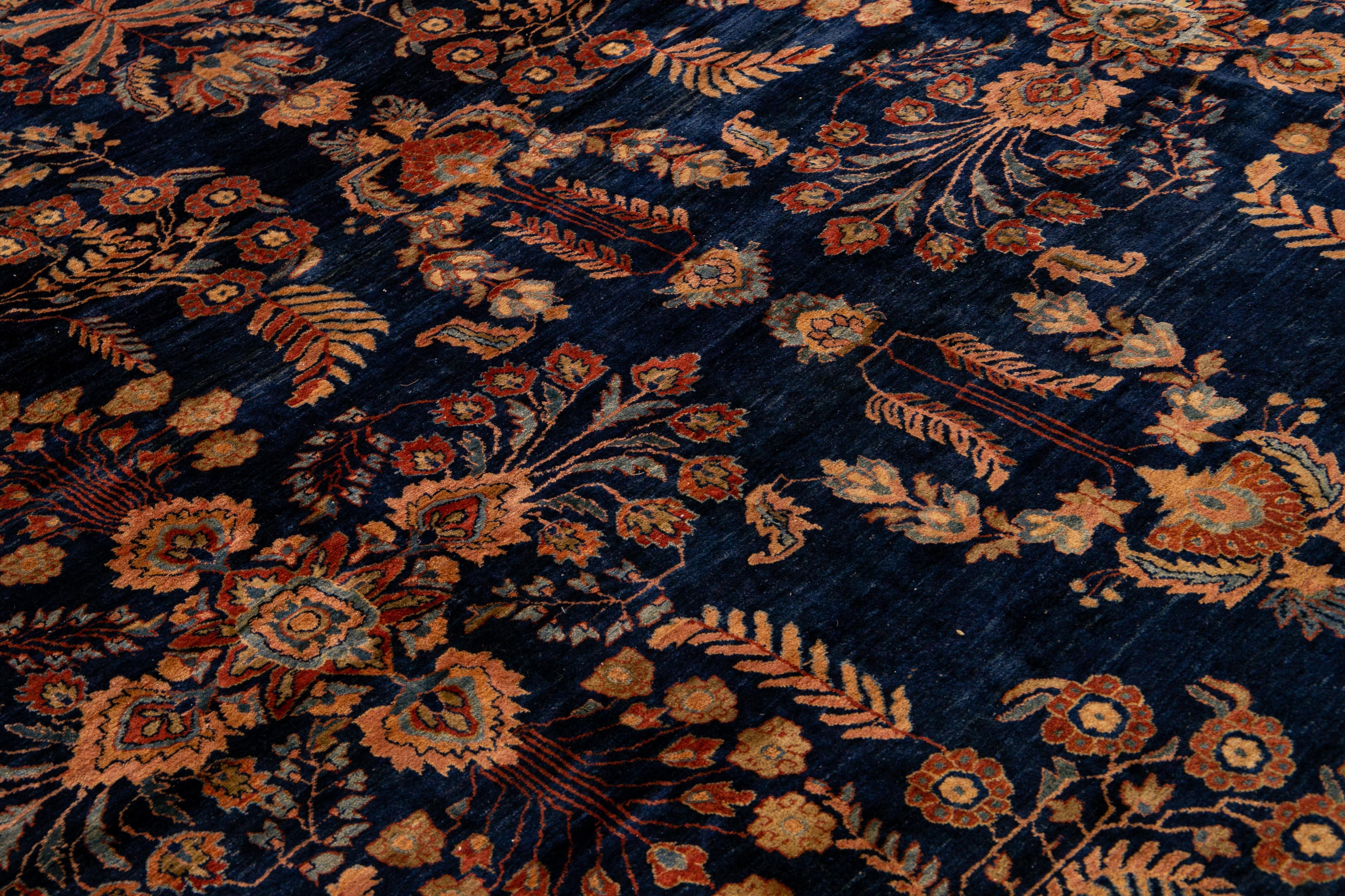 Antique Persian Sarouk Farahan Handmade Floral Motif Oversize Navy Blue Wool Rug For Sale 1