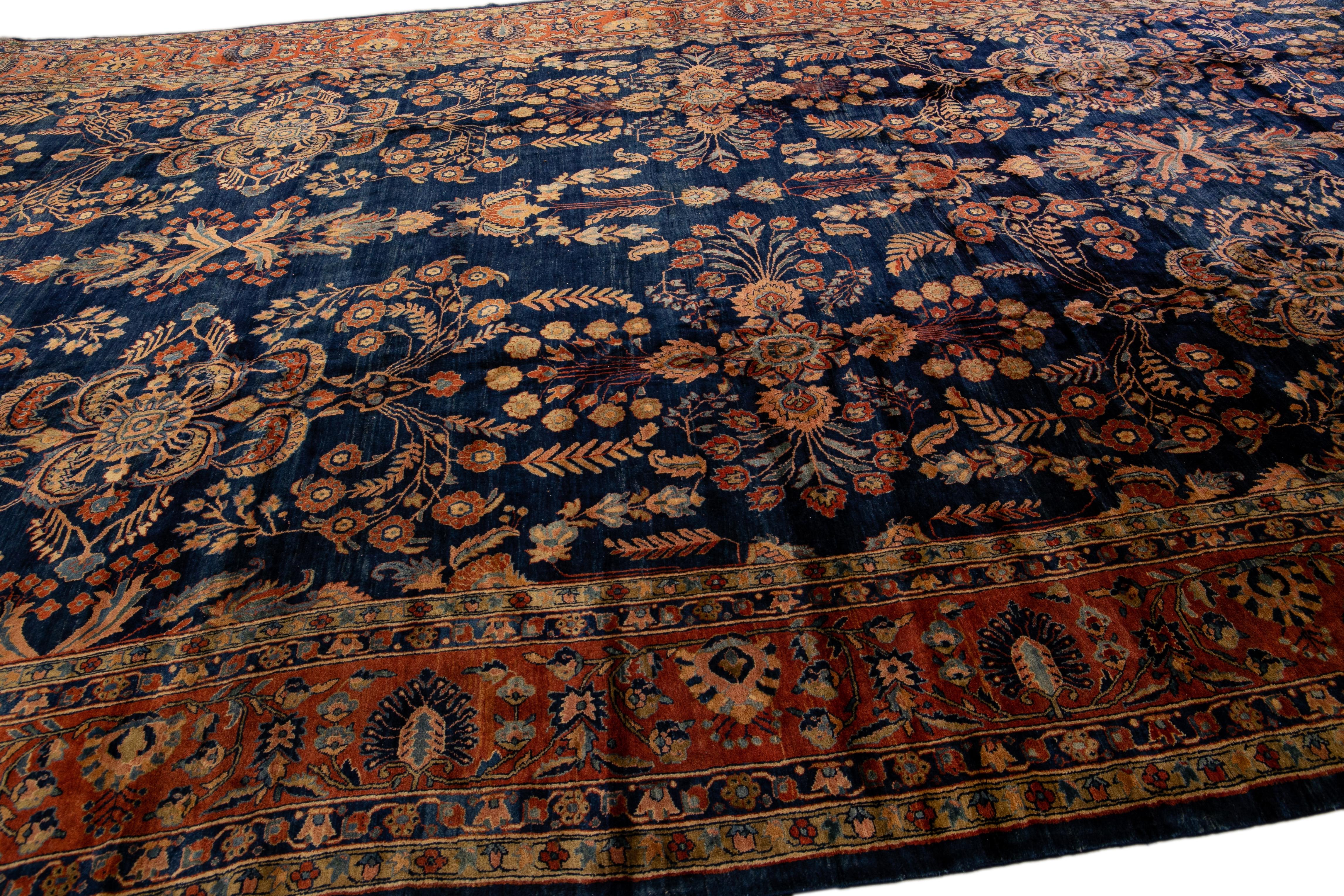 Antique Persian Sarouk Farahan Handmade Floral Motif Oversize Navy Blue Wool Rug For Sale 2