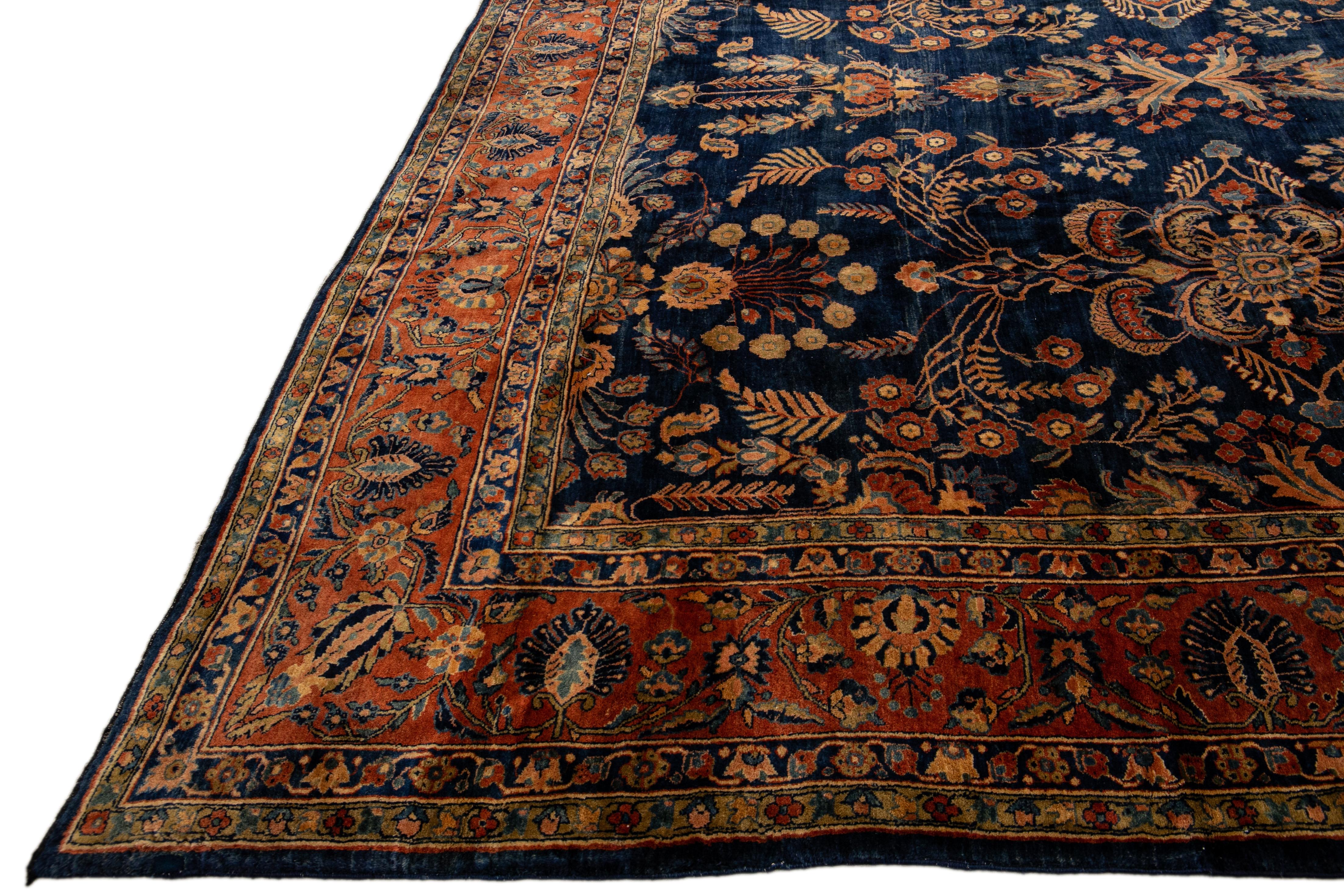 Antique Persian Sarouk Farahan Handmade Floral Motif Oversize Navy Blue Wool Rug For Sale 3