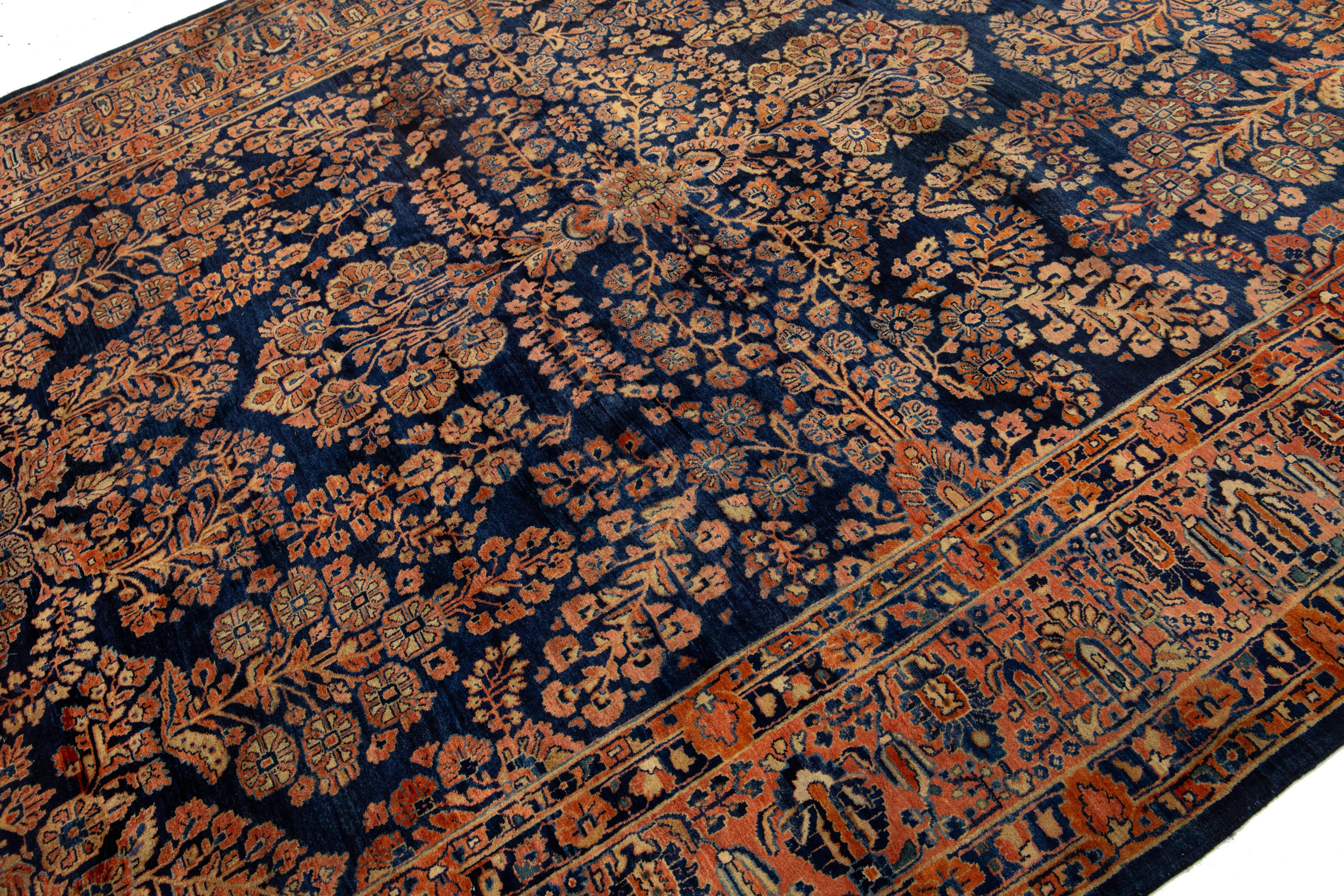Antique Persian Sarouk Farahan Handmade Floral Motif Wool Rug In Navy Blue For Sale 5