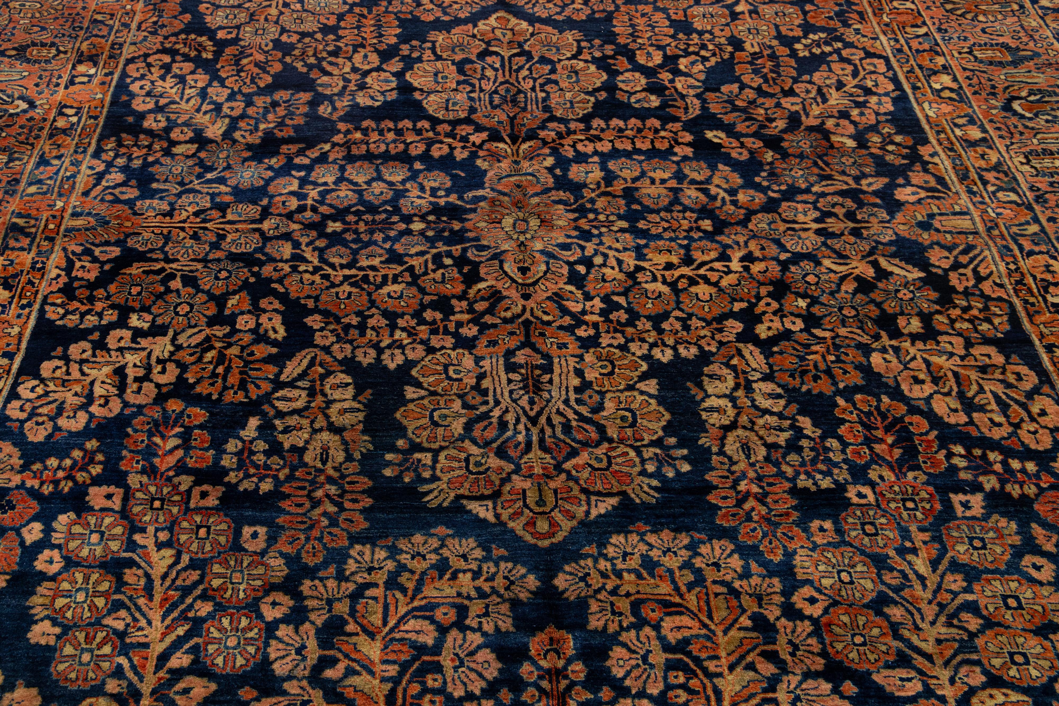 Antique Persian Sarouk Farahan Handmade Floral Motif Wool Rug In Navy Blue For Sale 2