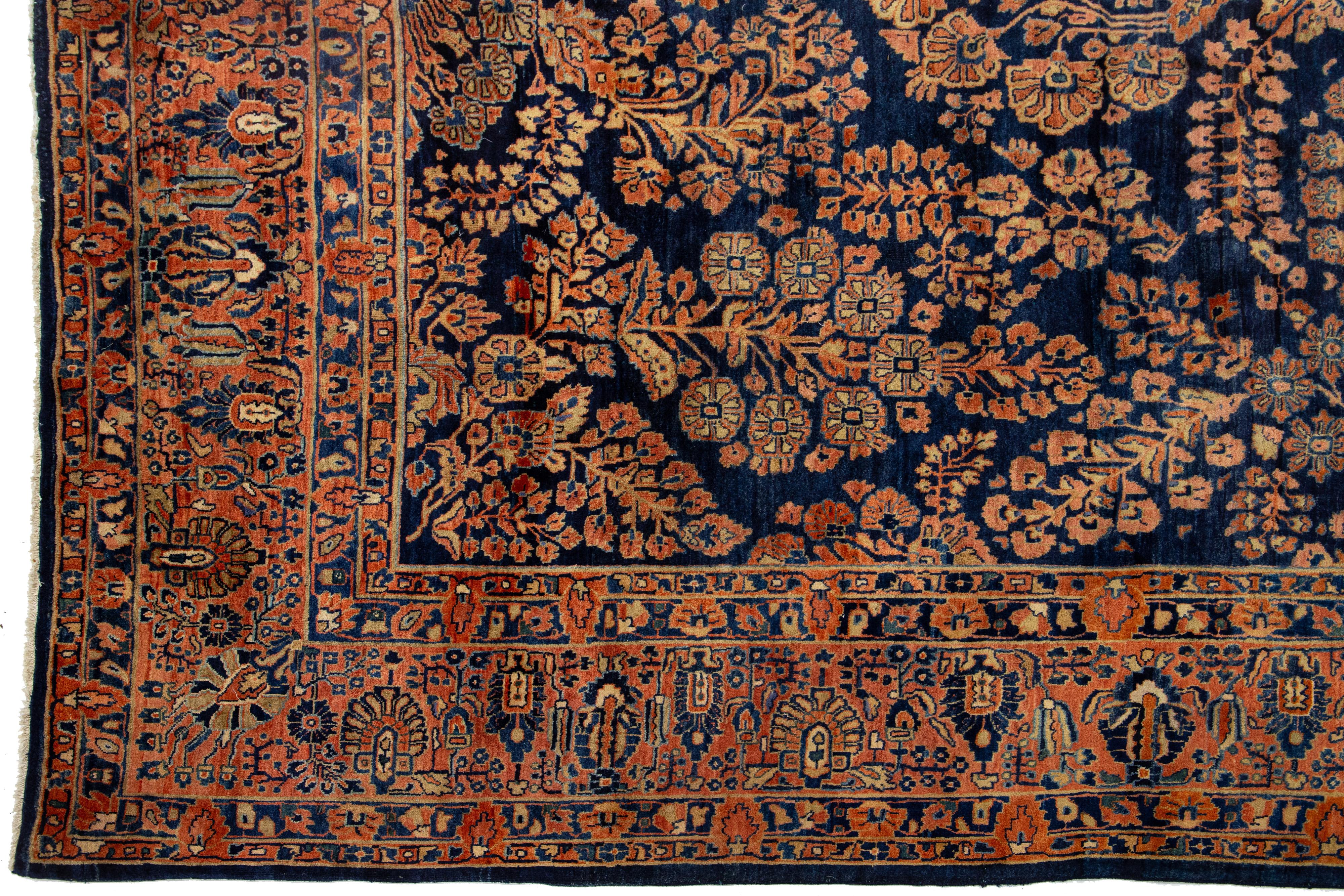 Antique Persian Sarouk Farahan Handmade Floral Motif Wool Rug In Navy Blue For Sale 3