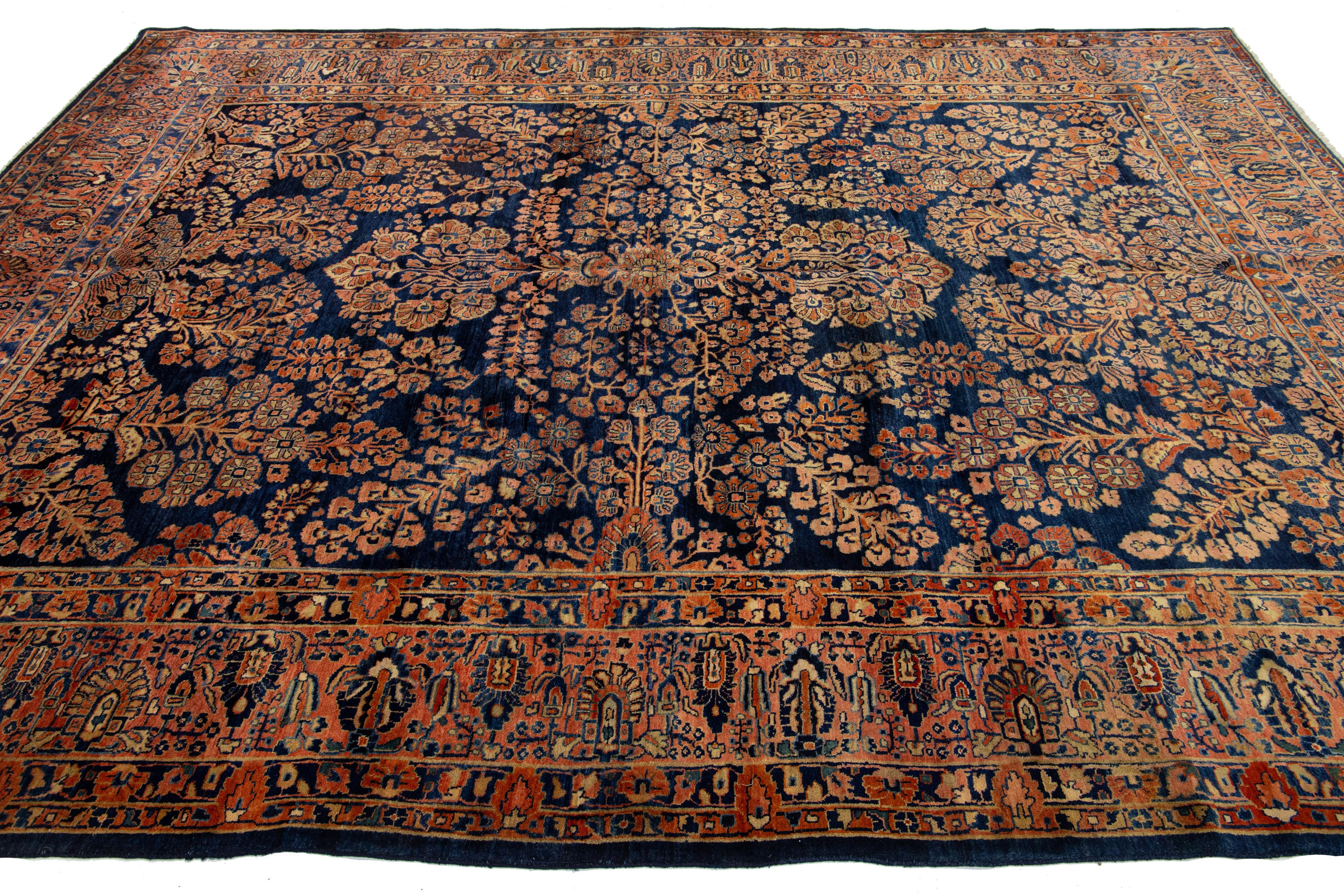 Antique Persian Sarouk Farahan Handmade Floral Motif Wool Rug In Navy Blue For Sale 4
