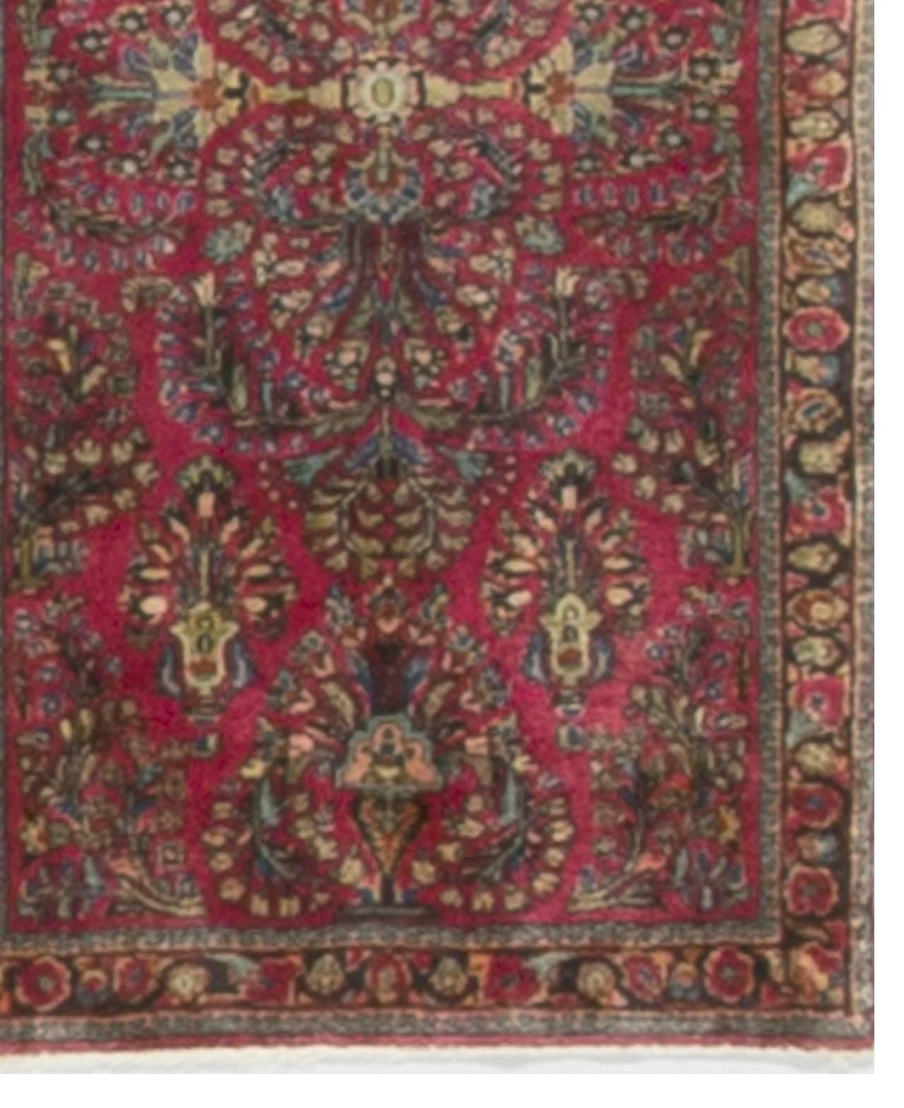 Hand-Knotted A small Persian Sarouk rug, circa 1900. For Sale