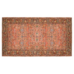 Tapis persan ancien de style Sarouk oriental, de grande taille avec un motif floral complexe