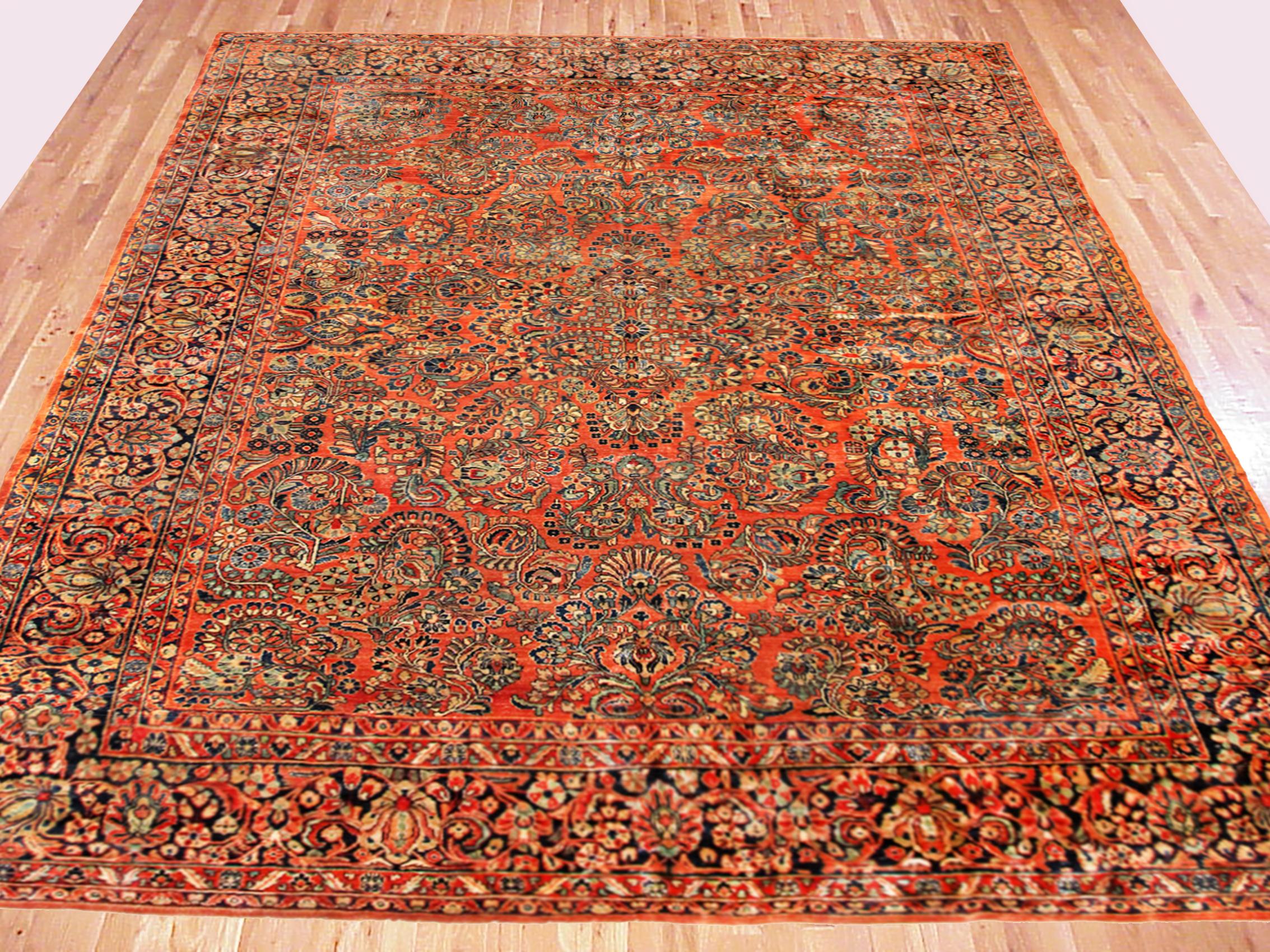 Antique Persian Sarouk Oriental rug, circa 1920, Room size.

An antique Persian Sarouk oriental rug, size 11'9