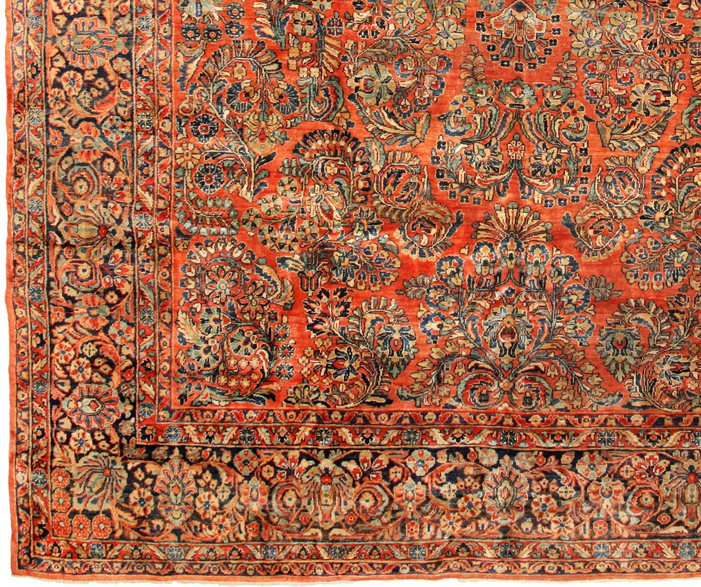 Early 20th Century Antique Persian Sarouk Oriental Rug, in Room Size, with Coral Tones, circa 1920 For Sale