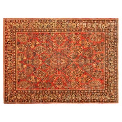 Antigua alfombra oriental persa Sarouk, en tamaño de habitación, con intrincado diseño floral