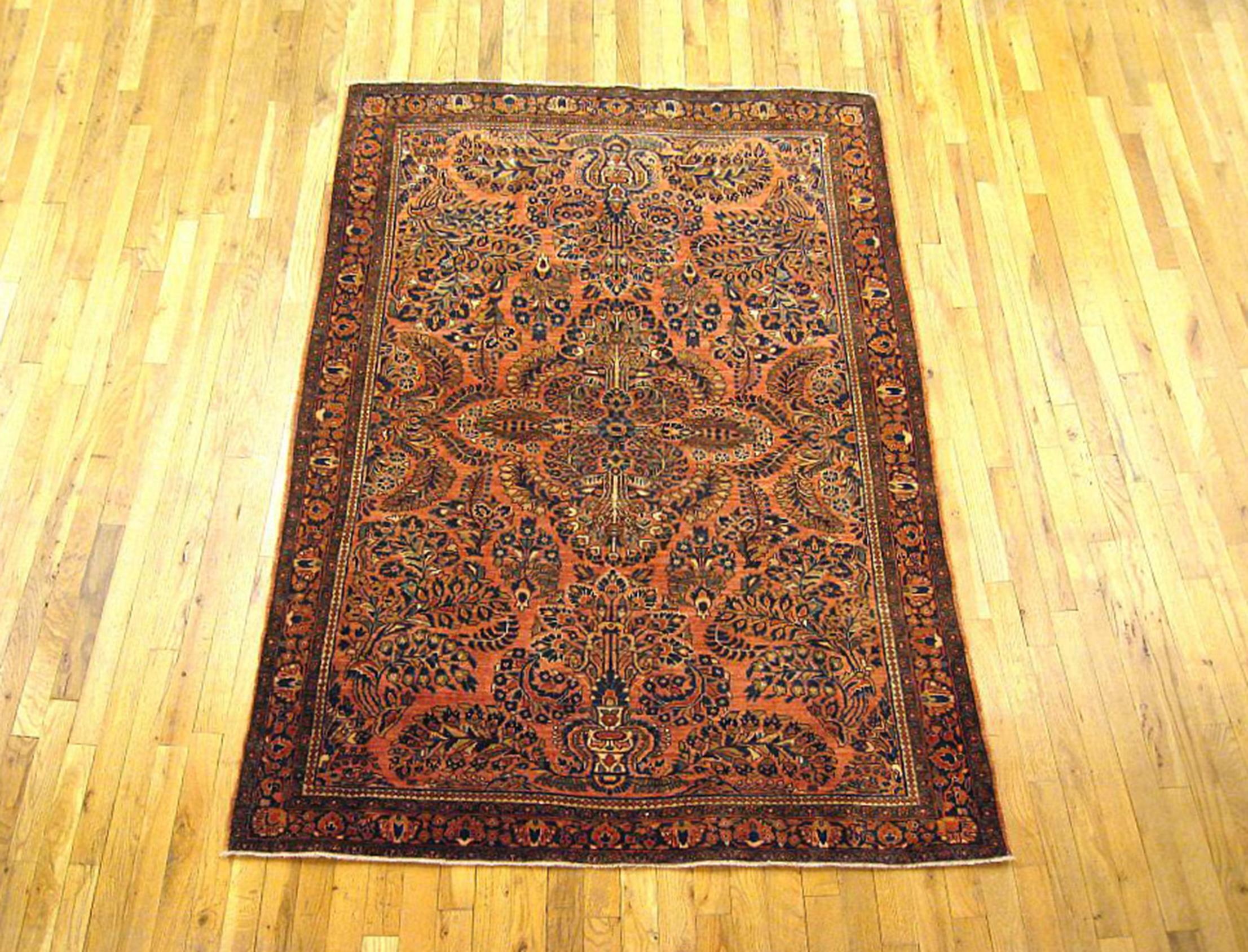 Antique Persian Sarouk Oriental Rug, circa 1920, Small size

An antique Persian Sarouk oriental rug, size 6'1