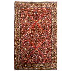 Tapis persan ancien de style Sarouk oriental, de petite taille, avec des tons de bijoux, vers 1920