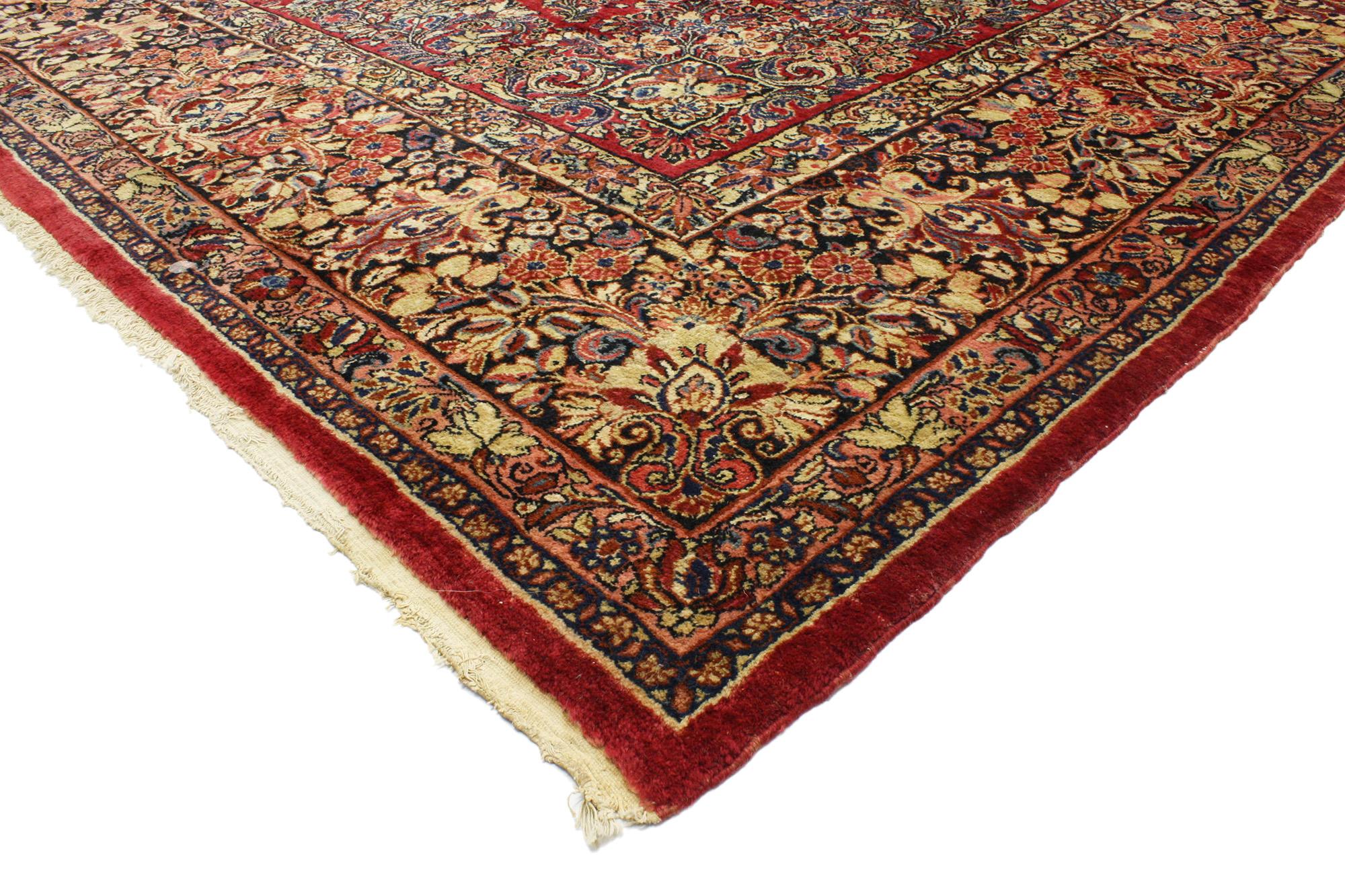 74960 Antique Persian Sarouk Rug with Victorian Style 10'03 x 17'10. With timeless floral design and a traditional color palette, this hand knotted wool antique Persian Sarouk rug is a captivating vision of woven beauty. The abrashed ruby red field