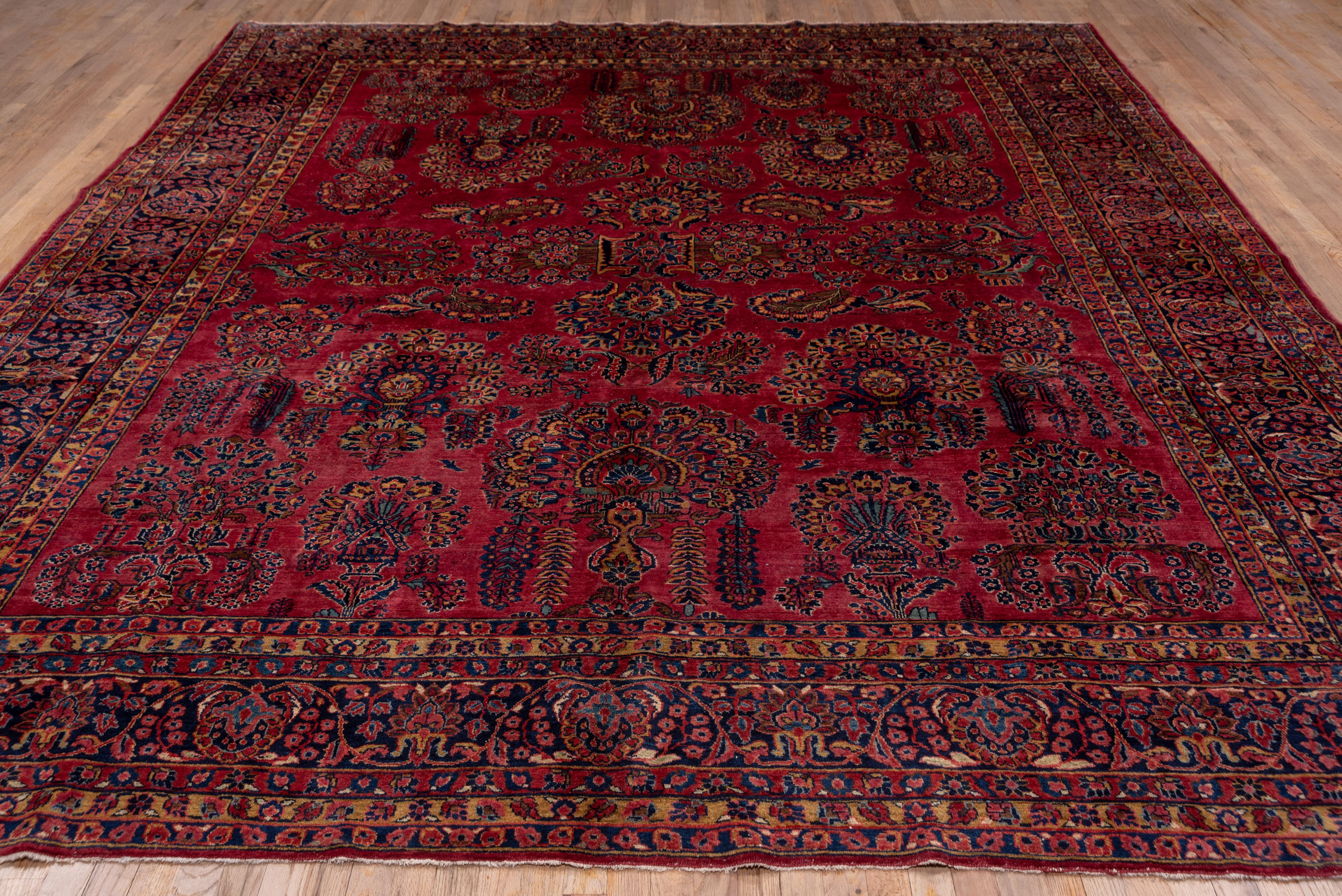 Wool Antique Persian Sarouk Rug, Bright Red Field, Gold and Blue Accents, Medium Pile For Sale