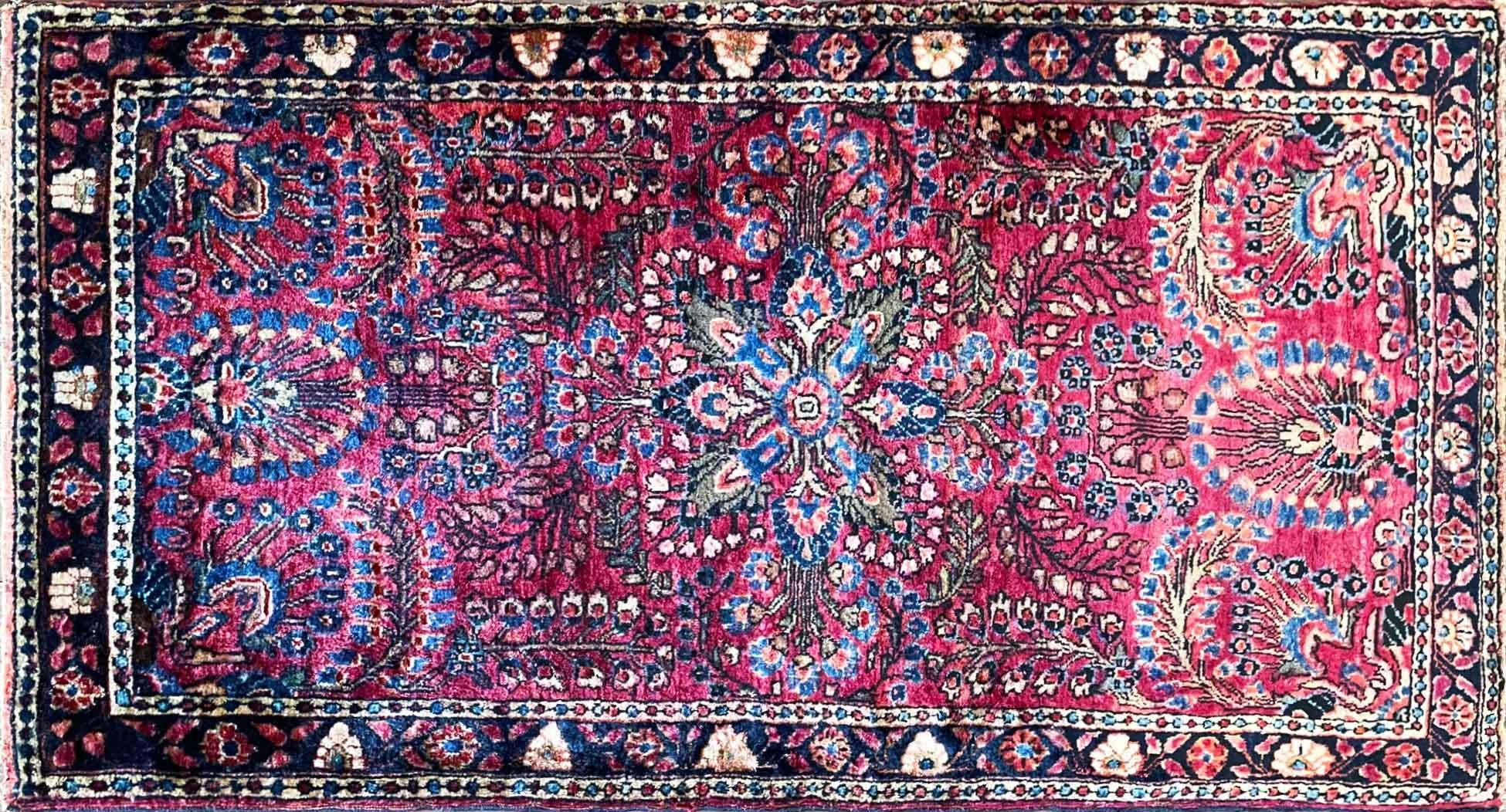 Antique handmade Northwest Persian Sarouk rug, c-1920, 2' x 4', fine wool, in red and blue color and traditional floral design and this rug has been woven in high quality, the condition is excellent and it has been cleaned professionally.
Antique