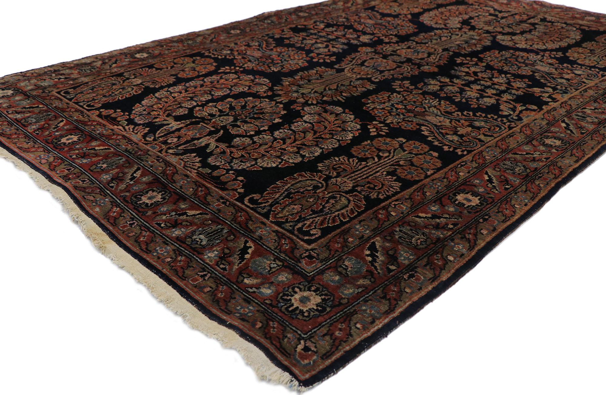 78135 Antique Persian Sarouk rug, 04'04 x 06'09?. ?Displaying an impressive array of floral elements with incredible detail and texture, this hand knotted antique Persian Sarouk rug is a captivating vision of woven beauty. The timeless design and
