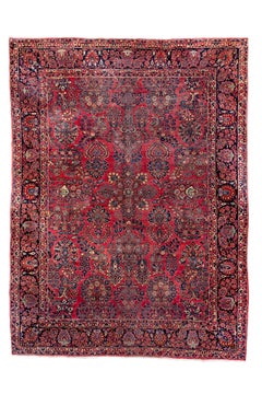 Antiker persischer Sarouk-Teppich mit floralem Allover-Muster in sattem Rot und Indigo