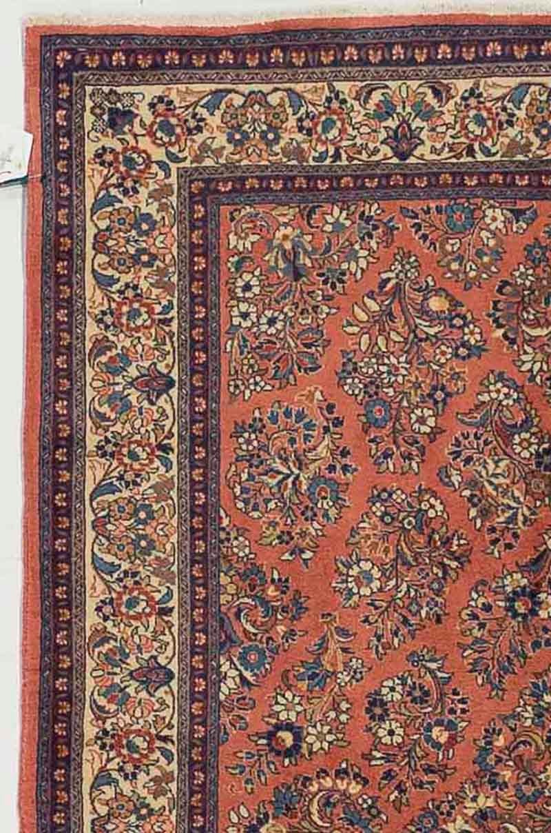 Hand-Woven Antique Persian Sarouk Rug with Blue and Ivory Flower Heads on Red Center Field