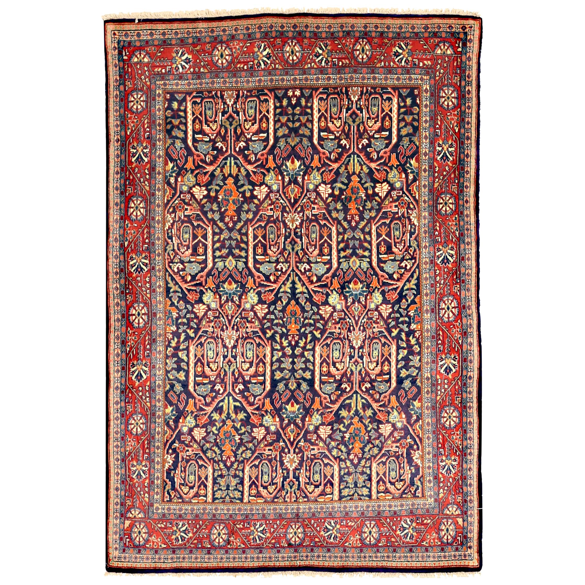 Antique Persian Sarouk Rug with Colored Botanical Details on Navy Blue Field For Sale