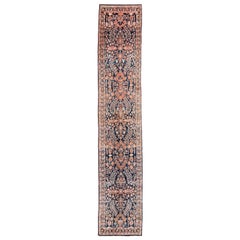 Antique Persian Sarouk Runner with Navy, Orange Wool and a Floral Design