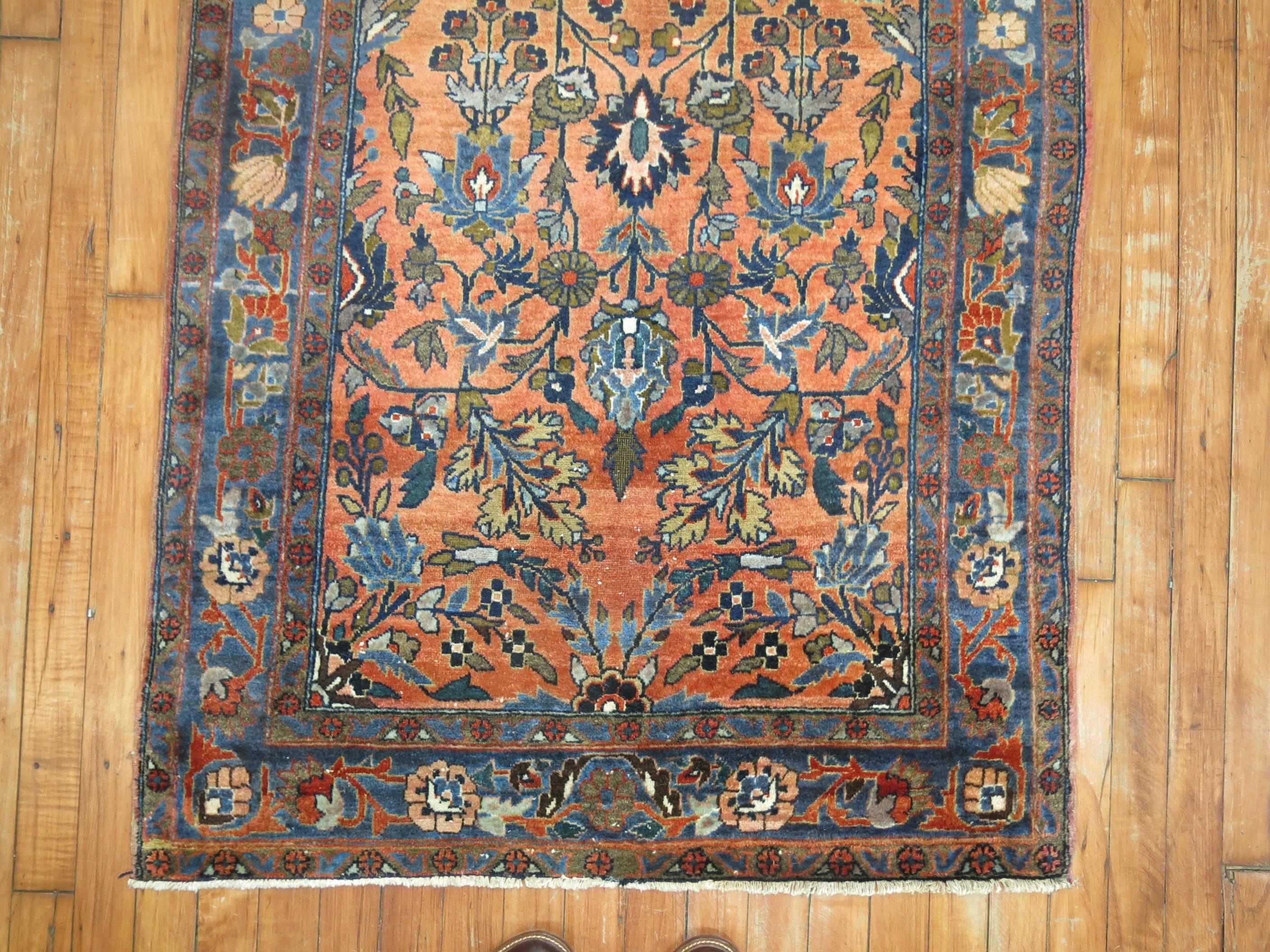 An early 20th century authentic Persian sarouk small runner.

2'11'' x 6'8''