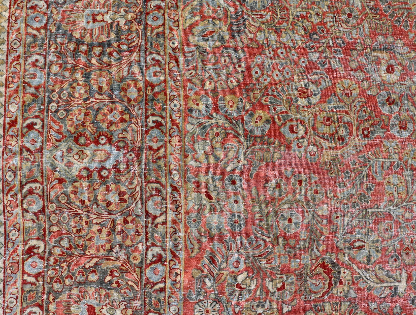 Sarouk Farahan Antique Persian Sarouk with All-Over Floral Design on a Light Red Field For Sale